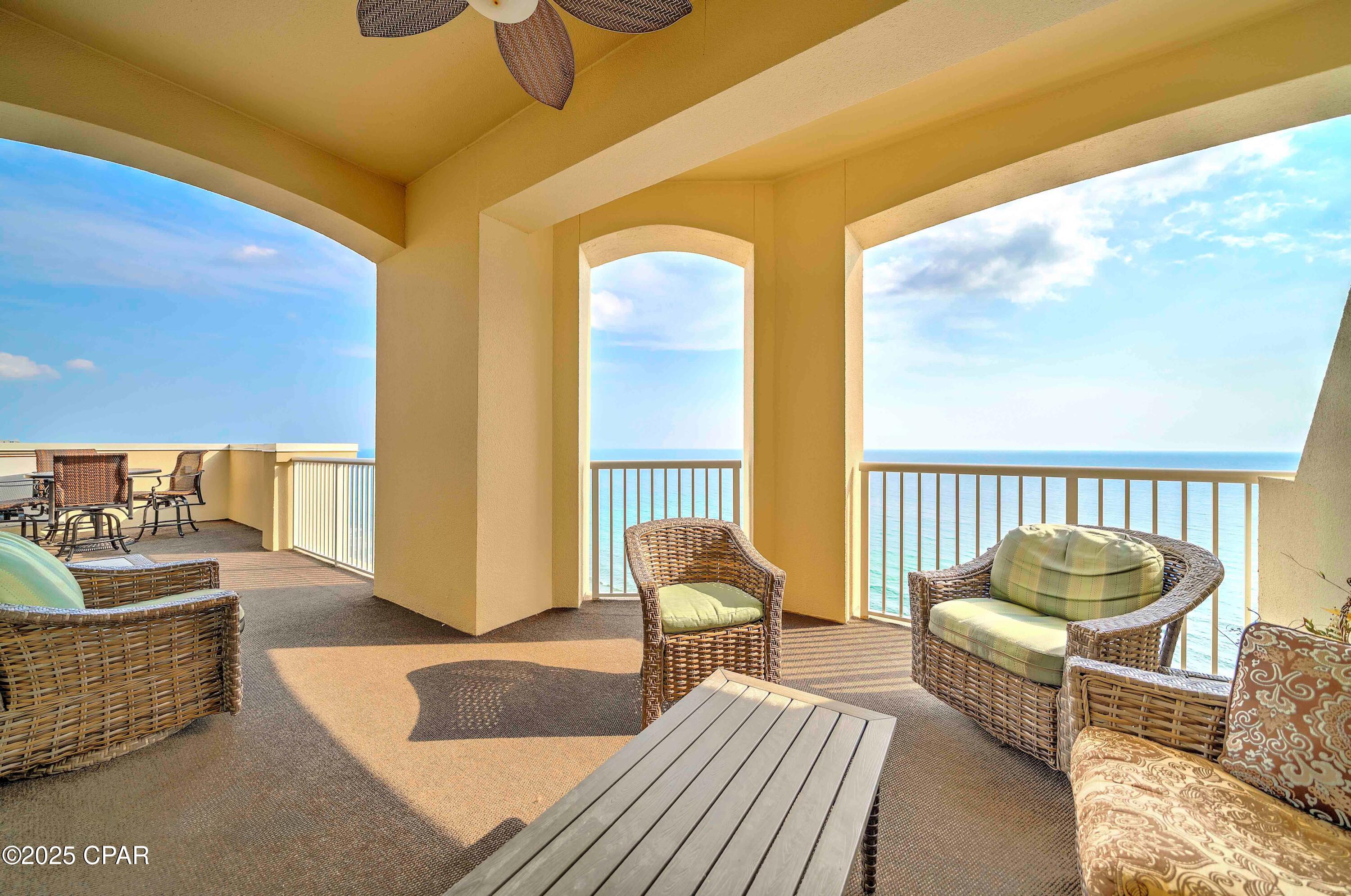 Rare Gulf-Front four-bedroom, three bath, fully furnished PENTHOUSE unit located at Grand Panama Beach Resort offering breath taking views of the Gulf of Mexico. This must-see property comes with an oversized balcony with ample room for two outdoor living areas and dining area offering breathtaking Gulf views, PLUS a private second balcony off one of the guest suites facing east to watch the sunrise over the emerald, green waters! Upon stepping inside, you are greeted by the beautiful tile floors leading into the main living area. The well-appointed kitchen with pantry features stainless appliances, a large breakfast, and a gorgeous backsplash perfect for entertaining guests. The kitchen is open to the living room, dining room and wet bar with wine fridge, that all have panoramic views and lead out to the private balcony perfect for both relaxation and entertaining with friends and family. The spacious master suite has access to the gulf front balcony, ensuite with dual vanities, a separate soaking tub, and a walk-in shower. There is a second master with ensuite, a single vanity, separate tub and walk-in shower located at the front of the unit, and two nice-sized bedrooms on the East side of the penthouse, one with a large East Facing private balcony for guests to enjoy. Even the parking is exclusive with two dedicated parking spaces in the private penthouse garage located under Tower 1! This non-rental unit has been meticulously maintained, and the dual HVAC units were updated in 2021. Grand Panama Beach Resort, one of the most desired resorts in Panama City Beach offers 24-hour security services, 2 resort style pools, with one being heated, beach side tiki bar, large fitness center, onsite general store, onsite bistro restaurant, owner's library, barbeque grills, and level 5 walk over from tower 2 to Tower 1. Don't Miss This Opportunity to Own a Piece of Paradise. Contact Us to Schedule a Viewing Today! Buyers should verify all important information.