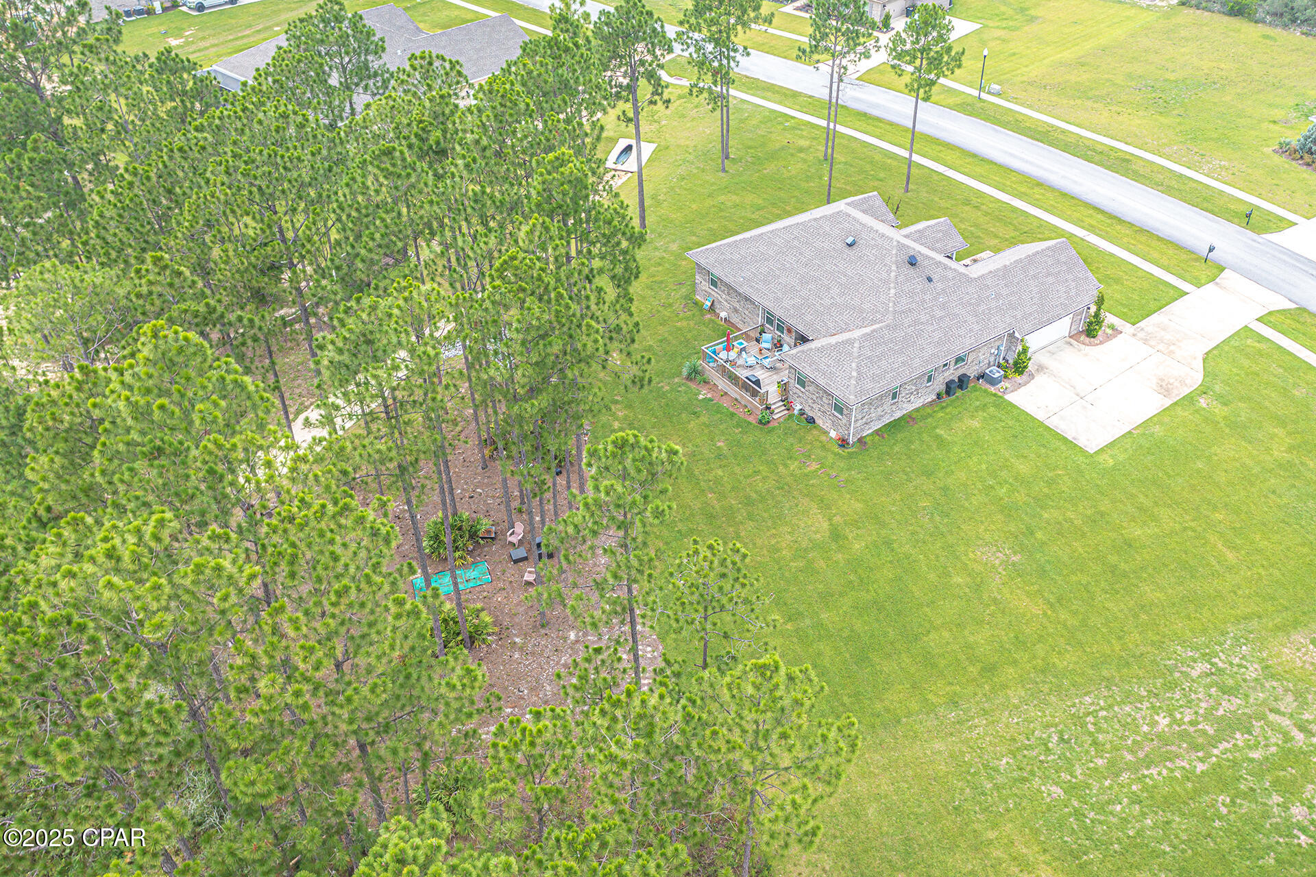 Welcome to ''The Coastal Breeze Estate '' Discover the perfect blend of comfort, community, and coastal living in this beautiful 5 Bedroom, 3 Bathroom home located in the popular Windswept Estates in Freeport, Florida. Built in 2020 this one story custom brick home offers everything you need. Step into a bright and expansive layout with large windows, generous bedrooms and living areas, perfect for gathering and entertaining. The heart of the home features an open-concept floor plan with modern kitchen, multiple seating areas, and a seamless flow into the outdoor living. Outside, enjoy the massive backyard with a custom-built deck that's perfect for summer BBQs, relaxing afternoons, or kids and pets play time Plenty of room for a Private Pool & Spa, Playground or a cozy outdoor fireplace for the cool winter evenings. Windswept Estates is known for its spacious home sites, beautiful amenities to include a Community pool & Pool house, Tennis and Basketball courts, spacious Kids Playground and the well maintained 18-hole Golf Course located in the heart of the community (Separate Membership is required). Short drive to top-rated schools, local restaurants, sports complexes, and the beautiful beaches and bay access the Emerald Coast is famous for.Whether you're commuting to Santa Rosa Beach, Panama City Beach, Niceville, or Eglin AFB, you'll appreciate easy access via Highway 20.Come experience the relaxing vibe and friendly lifestyle of 235 Coastal Breeze Drive today - where space, location, and community come together. Upgrades to include - all new ceiling fans, finished attic space with added staircase, the living room has been painted as well. TV's and laundry appliances are excluded. Current Furnishings inside the home are similar but not as shown in the pictures. Buyer, Buyer's Agent to confirm all information.