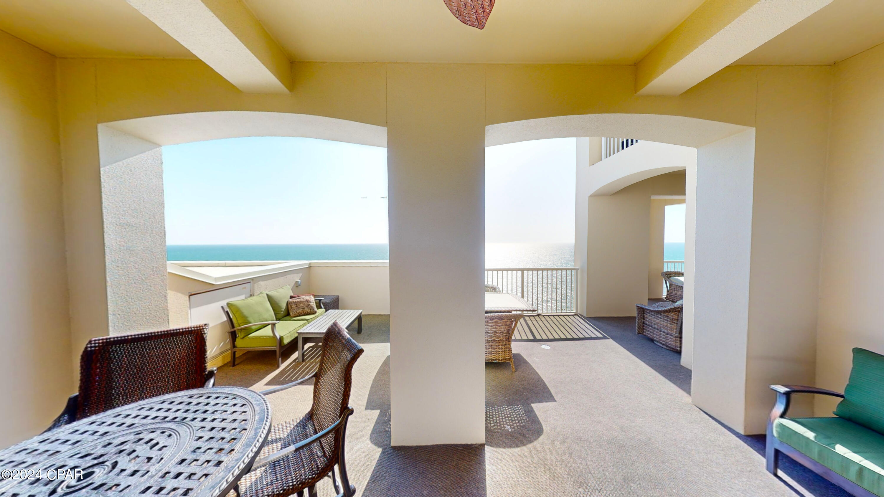 Rare Gulf-Front four-bedroom, three bath, fully furnished PENTHOUSE unit located at Grand Panama Beach Resort offering breath taking views of the Gulf of Mexico. This must-see property comes with an oversized balcony with ample room for two outdoor living areas and dining area offering breathtaking Gulf views, PLUS a private second balcony off one of the guest suites facing east to watch the sunrise over the emerald, green waters! Upon stepping inside, you are greeted by the beautiful tile floors leading into the main living area. The well-appointed kitchen with pantry features stainless appliances, a large breakfast, and a gorgeous backsplash perfect for entertaining guests. The kitchen is open to the living room, dining room and wet bar with wine fridge, that all have panoramic views and lead out to the private balcony perfect for both relaxation and entertaining with friends and family. The spacious master suite has access to the gulf front balcony, ensuite with dual vanities, a separate soaking tub, and a walk-in shower. There is a second master with ensuite, a single vanity, separate tub and walk-in shower located at the front of the unit, and two nice-sized bedrooms on the East side of the penthouse, one with a large East Facing private balcony for guests to enjoy. Even the parking is exclusive with two dedicated parking spaces in the private penthouse garage located under Tower 1! This non-rental unit has been meticulously maintained, and the dual HVAC units were updated in 2021. Grand Panama Beach Resort, one of the most desired resorts in Panama City Beach offers 24-hour security services, 2 resort style pools, with one being heated, beach side tiki bar, large fitness center, onsite general store, onsite bistro restaurant, owner's library, barbeque grills, and level 5 walk over from tower 2 to Tower 1. Don't Miss This Opportunity to Own a Piece of Paradise. Contact Us to Schedule a Viewing Today! Buyers should verify all important information.