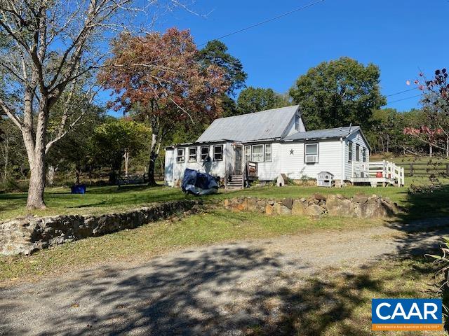 Sixteen acres in northern Albemarle County. Two parcels: a 1940s two-bedroom cottage (900 sqft) priced “as is”, a handyman’s project on two acres, plus fourteen acres of cleared fields, wooded trails, and sweeping countryside views. Quiet country living twenty minutes from Charlottesville’s shops and restaurants. Build your dream home. Plant a vineyard. Design a private retreat. Priced to sell. Don’t wait—good land doesn’t stay.