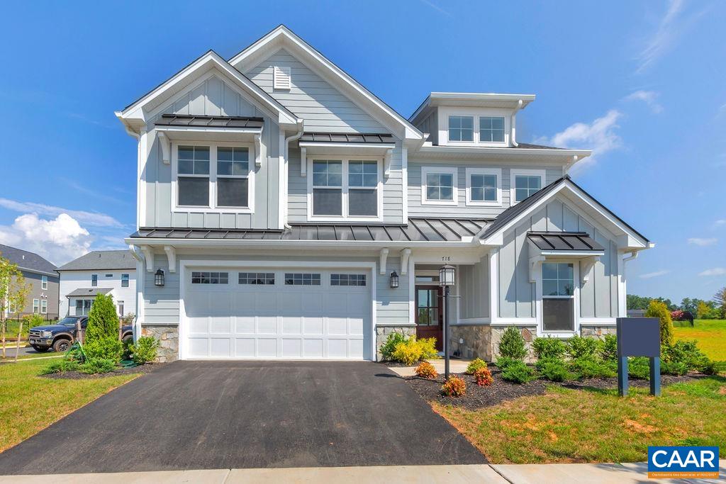 The To-Be-Built Aspen in Belvedere functions as an open-concept design but each dedicated space remains purposeful and cozy. Must haves like a private study, walk-in pantry, and drop zone complete the main level in addition to a large kitchen that flows conveniently into the family room and dining area. The upstairs showcases an airy loft perfect for a play room, second family room, or work from home space, 4 bedrooms, spa-like baths, a luxurious owner's suite + the added convenience of a connected laundry room. Numerous options are available to custom tailor this home to meet the way you want to live. This floor plan is open and airy, with an impressive list of included features including a gourmet kitchen, walk-in pantry, gas fireplace, and more!  Belvedere offers an array of amenities, including access to parks, close proximity to the Rivanna trailhead, the nearby SOCA Fieldhouse, a dedicated dog park for pet owners, and enchanting playground areas.  Pricing varies by elevation. Lot premiums may apply. Photos are of similar home and may show optional upgrades.