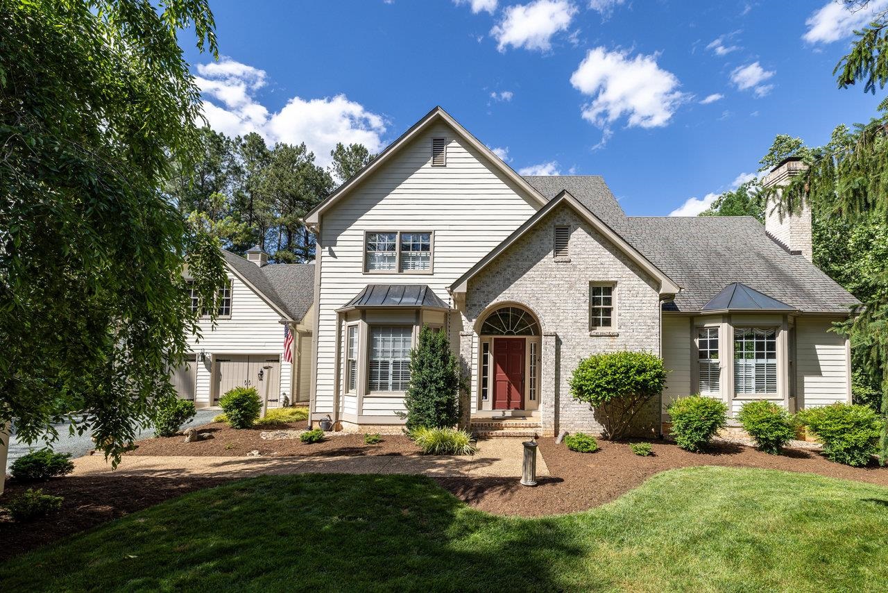 Appraised at 1.03M Let's explore, shall we? Enjoy the beautiful landscaping, fresh mulch, pressure washed siding and the wonderful Koi pond surrounded by 4.75 acres of mature woods.  Let's look inside now, a warm natural light foyer welcomes you as you find your way into the expansive great room with ceilings that sore to over 16' with floor to ceiling windows, Also you will love the hardwood floors, whole home generator, coffered ceiling in kitchen, radon mitigation, buried propane, and a wood burning fireplace. Steps away is a large kitchen, tile counters and a oversized island leading to the light filled breakfast nook. Rounding out the main level find an owners suite with bath and guest half bath. Follow your way up to the tranquil loft featuring open office space, built in shelves and storage, also from here you can overlook the great room and foyer. Two nice sized light-filled bedrooms and full bath finish out the second floor. Head below to the rec room and family room combination. With tons of room this area also offers the the 4th non-conforming bedroom, full bath, laundry and storage!  over garage space and large deck for looking over the Koi pond and woods. Call today!