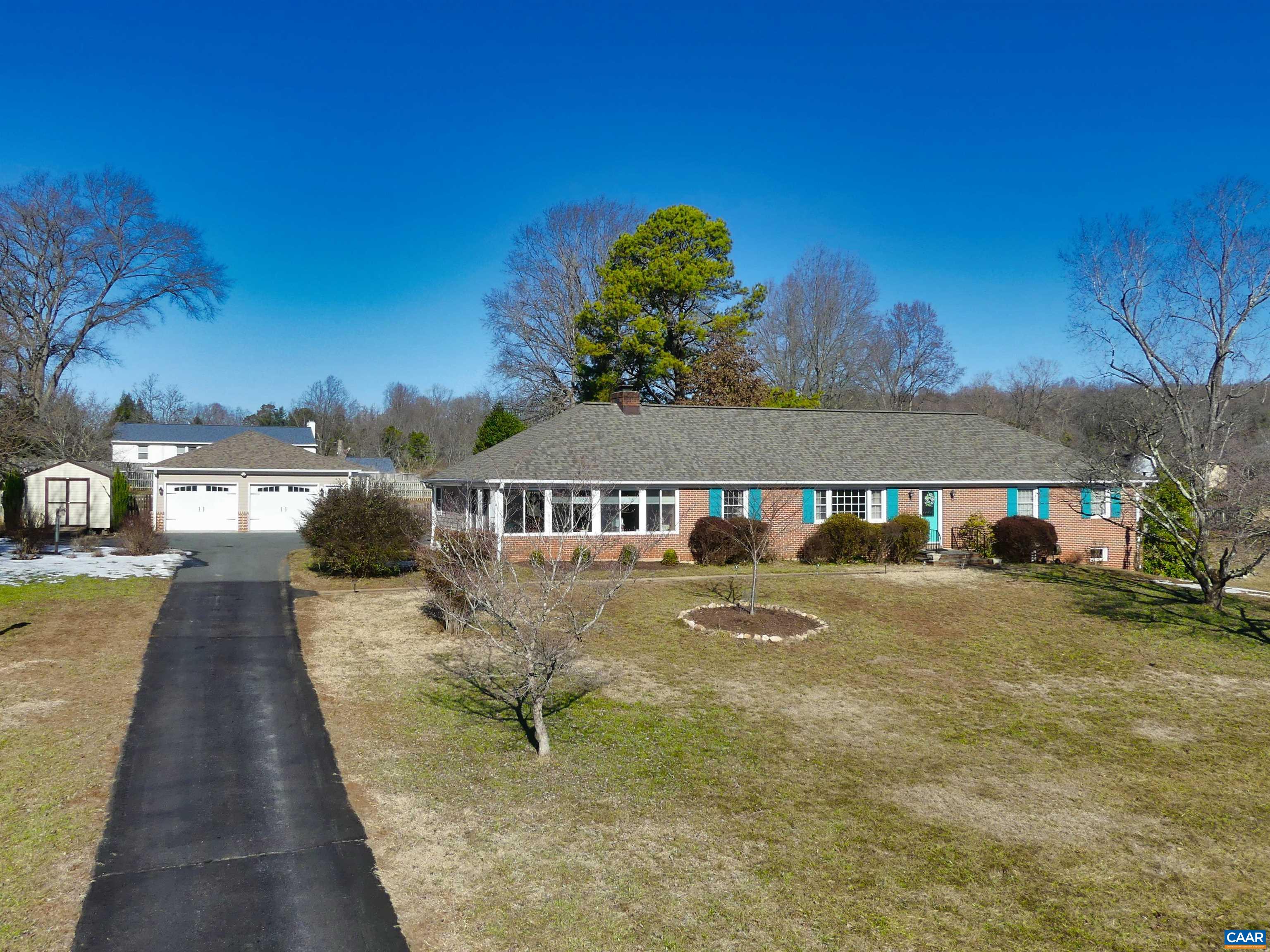 Beautifully updated and maintained brick ranch in Key West. Just 2 miles to Pantops yet you feel out in the country. The custom kitchen was added in 2018 and features granite counters, cherry cabinets, and breakfast bar which transitions to the two-wall windowed dining area bringing the mountain views inside. The original kitchen area still operates as a 2nd kitchen with the addition of a laundry and patio entry sitting area. The expansive family room holds the fireplace which has wiring for electric logs or can be converted to propane logs (not used by the owners). Walkout French doors lead to the covered and open patio areas. A separate living/sitting room and home office complete the left side of the home. The right side holds the primary suite, 2 front bedrooms and a second full bath. Cherry doors grace the main level. Continue down to the rec room, 4th bedroom with full bath and large unfinished basement area. The 2018/19 garage is about 1000 s.f. with 2 bays and a bonus workshop area behind. Extra power has been run to install an HVAC in the garage/shop if desired. New architectural shingle roof in 2025. Click on the virtual tour link to take a 360-degree walkthru tour. Ting available soon.