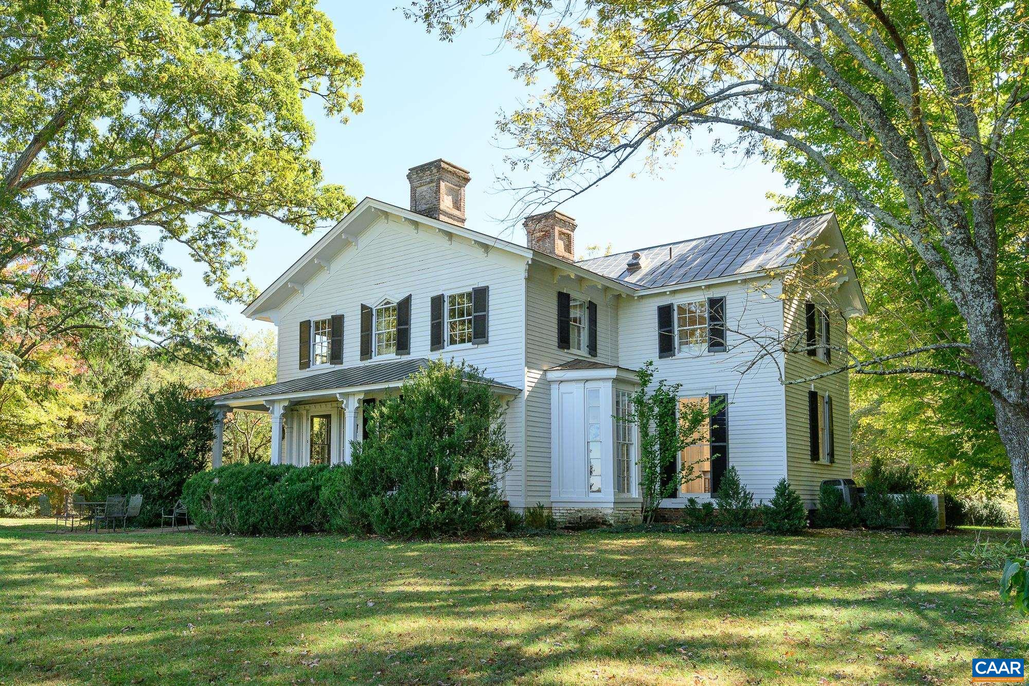 c.1856, Oakleigh is a beautifully renovated, turn-key country estate in the heart of the Green Springs Historic District.  The property includes 149 manicured acres with 2 ponds. The home enjoys total tranquility, with no road exposure whatsoever.  It has been carefully modernized and renovated over the last 30 years by the current owners and includes 3 bedrooms, 2.5 bathrooms and endless charm.  Truly, this home is Architectural Digest- worthy!  Other structures include a smokehouse, horse or livestock barn, chicken coop and large workshop/equipment shed, which could be finished as a guest house.  All dependencies have water and electricity.  Wonderful boxwood ringed vegetable garden.  Under Conservation easement with 1 division right.  There is an excellent building site with mountain views and tucked well away from the main residence.  25 mins to Charlottesville and 40 to Richmond.  Fiber optic!