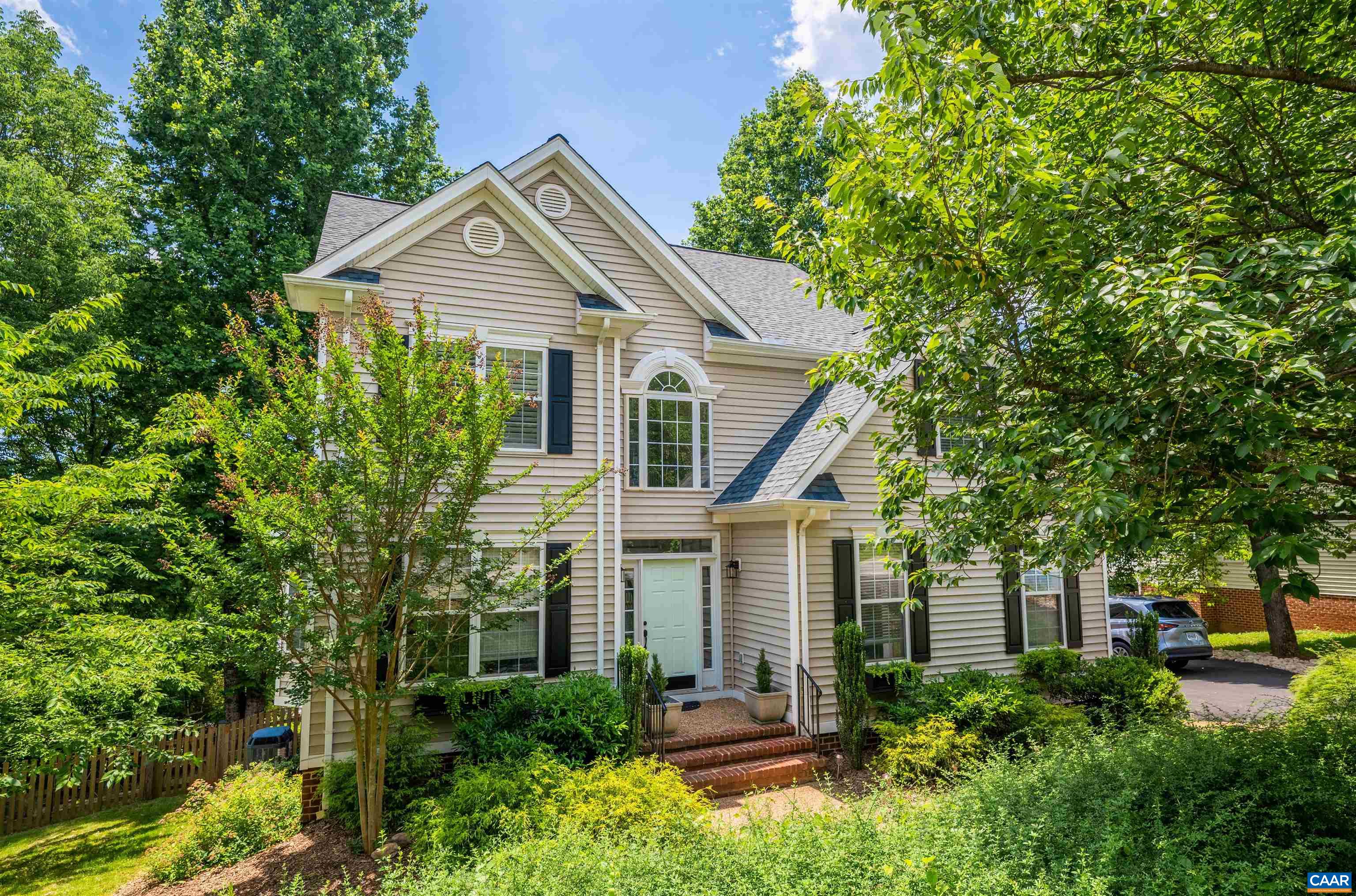 A MUST SEE! Immaculately kept and updated, this stunning natural light-filled Colonial welcomes you with an open and spacious floor plan. Gleaming hardwood floors, electric fireplace. French doors open to a spacious private screened in porch. Renovated eat-in kitchen with gourmet amenities: a breakfast bar, quartz countertops, stainless-steel appliances, gas range, wood island, pantry. Top level features a luxurious master suite with vaulted ceiling, custom walk-in closet, en-suite bathroom with double vanities, a stand-up double shower, 3 additional bedrooms, full bath and laundry. 1,000 sq. ft. finished basement has ample space for relaxation, entertainment, and storage: it contains a game/rec room with built in bookcase, two bonus rooms that can be used as exercise room and/or office, a full bathroom and access to screened in porch. Two-car garage with wifi operated door and Tesla charger. You will love the trails, majestic mountain views and the great community in Fontana neighborhood! It’s convenience to I-64, 250, and Downtown cannot be beat. Community amenities include a pool, playground, picnic area, tennis courts and a basketball hoop.