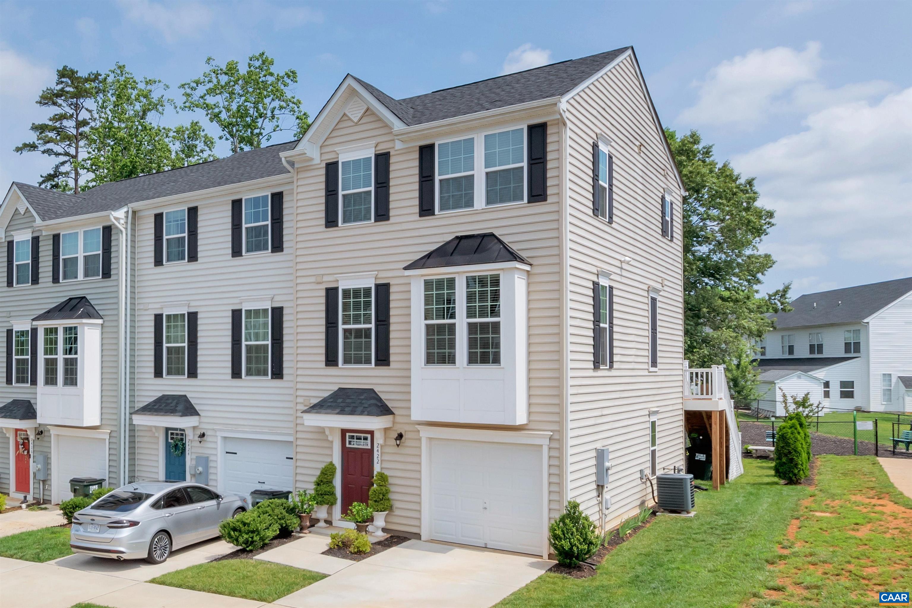 GREAT NEW PRICE! Don't miss this lovely Riverwood End Unit Townhome, located just a few minutes from Chris Greene Lake, UVA Discovery Park, NGIC/DIA and the Charlottesville airport. Unlike some of the busier streets, Pocoson Wood has just one entry so no cars constantly driving by. Walking Trails are close by and provide access to the Rivanna River for kayaks. The kitchen has been spiced up with color and the granite counters and tiled backsplash enhance the mediterranean decor. The large kitchen island offers extra seating and prep space for the avid chef while entertaining. The master bedroom features a tray ceiling with en suite bath, dual vanities and views of Piney Mountain. The upper rear deck has stairs leading down to the beautifully landscaped backyard. Owners have created a delightful garden spot and the side yard potentially could be extended by enclosing the space with a fence if the next owner desires. Just beyond the yard is a fenced playground, so convenient for little ones! Don't miss out! A MUST SEE!