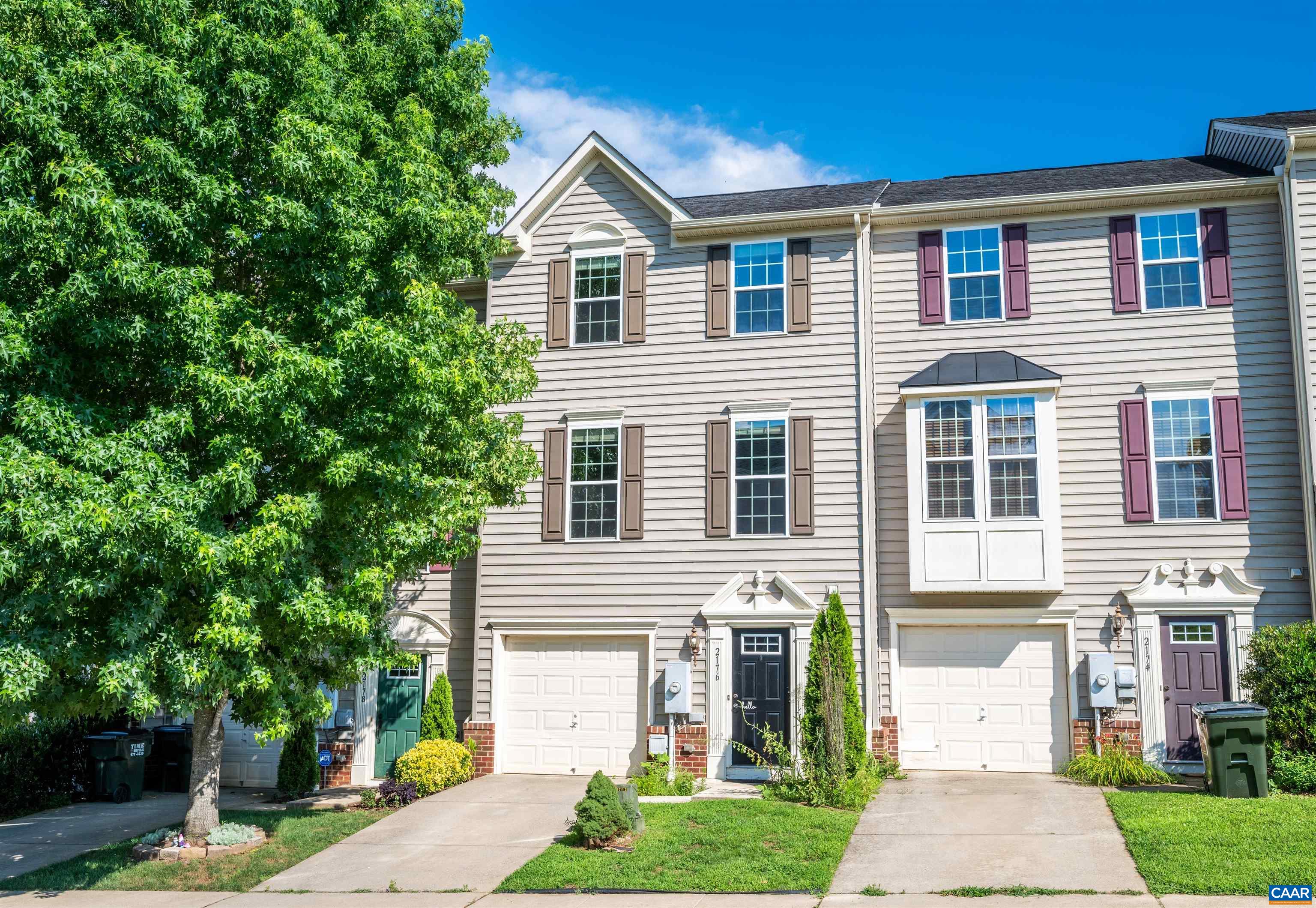 This townhome features an open floor plan and 3 finished levels of space to enjoy. New carpet throughout. It includes a garage, family/rec room or home office on the lower level. Fenced in back yard with a fire pit. The sun-filled main living level is perfect for entertaining and fun. You'll love the eat-in kitchen with stainless steel appliances, center island, breakfast bar, and the spacious living/dining area. Access from kitchen to back deck for grilling with peaceful views. Top level features a master bedroom with an en-suite bathroom, two additional bedrooms, the second full bath, and a laundry closet with a full-size washer/dryer. All just minutes from the Hollymead Shopping Center and Charlottesville Airport.