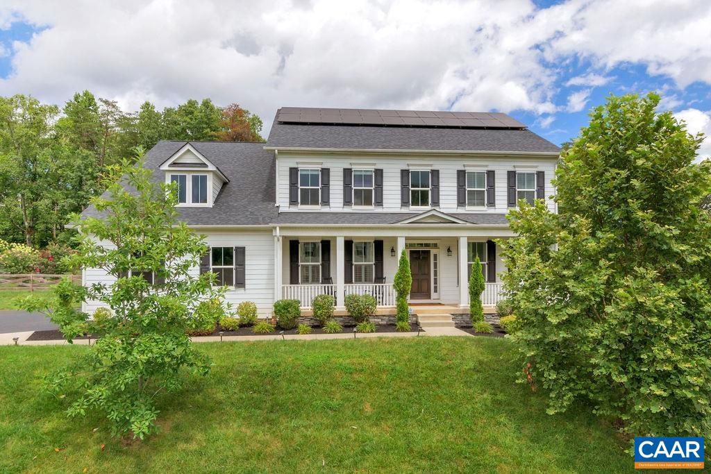 Better than new home located just 9 min to UVA Hospital!  This home enjoys an open floorplan with many upgrades and special features, like a state of the art kitchen with a huge island and quartz counters, ss appliances, and a walk-in pantry with built-in wood shelves. 1st floor office or kids activity room.  Master bedroom with seating area, elegant master bath with separate vanities and a huge walk-in closet that will make any fashionista proud.  Terrace level is currently unfinished and is used for storage but has a rough-in for bathroom and calls for future expansion. 2 car garage, screened porch, and solar panels.  Excellent elevated lot with mountain views!