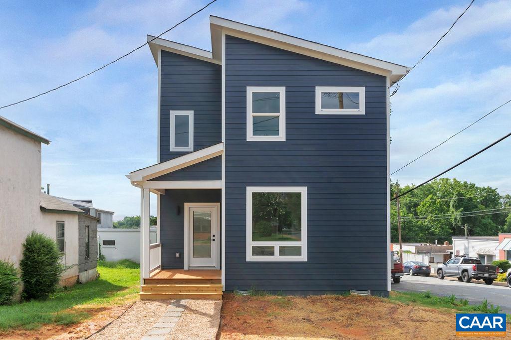 Public Open House 8/7 1-3 p.m. Rare opportunity for new construction in the city. Stunning 3 bedroom, 2.5 bath ne contemporary within walking distance to the Downtown Mall and the new Dairy Market, coffee shops, and restaurants. 1 block from bus route. Custom Quality Construction. Open living room, kitchen, and dining area, large laundry room; kitchen features: modern cabinetry, granite counters, oversized island with seating, and very large walk-in pantry, hardwood floors throughout. Spacious master has vaulted ceiling, walk-in tiled shower, his and her pantry, and walk-in closet 2 large additional bedroom with access to second full bathroom with custom tile work and cabinetry. Low maintenance Hardiplank exterior .Corner lot with nice rear yard and deck, really alley access in addition to lots of on street parking. Owner/Agent. Taxes estimated
