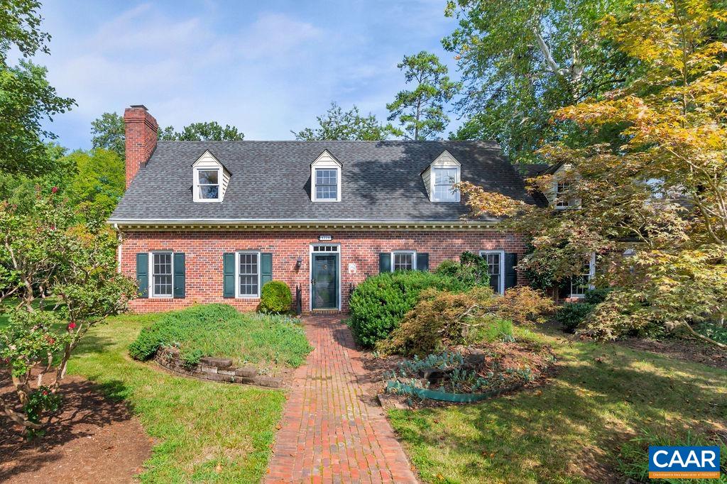 Open House Sun 9/11 2-4PM   Curb appeal!  Set on a corner lot, this 4 bedroom, 2.5 bath brick cape cod offers a tremendous opportunity to own an elegant home in an established neighborhood off of Rio Rd.  Features incl’ – spacious floorplan, bonus room over garage that could be used as a 4th br, built-ins, large laundry room, 225 sqft screened porch with vaulted celling, garage, shed for extra storage, and more!  A lot of potential!