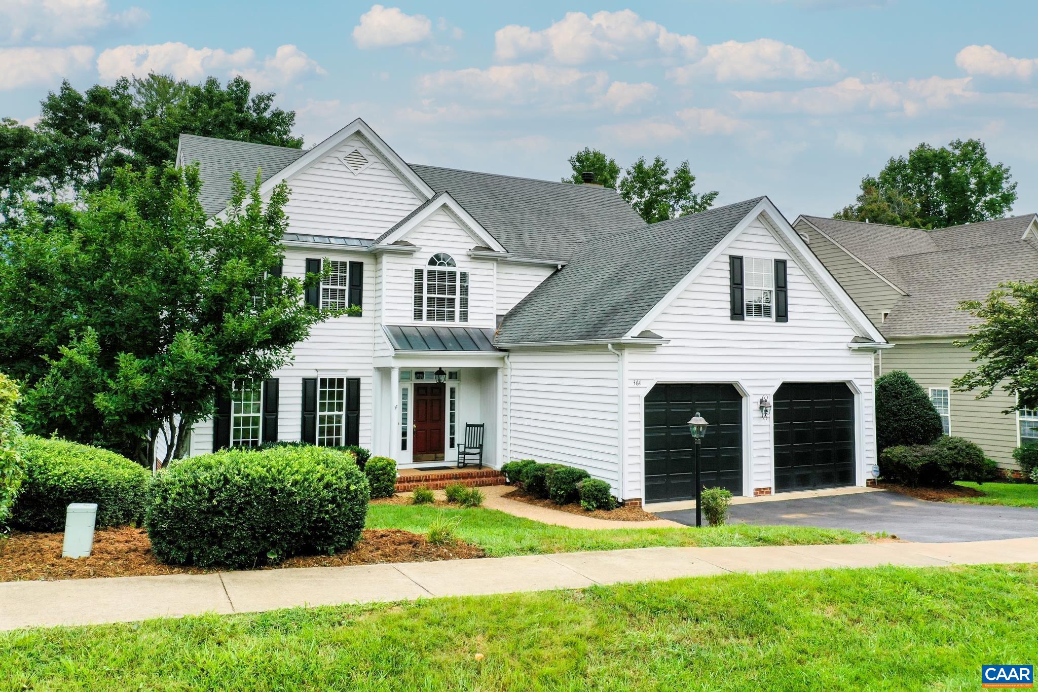6 Bedrooms with lake and mountain views in Crozet! This home has been refreshed top to bottom! With freshly painted walls, stylish lighting and fans, and new carpet in the basement this home is move-in ready! Entertainers will love the generous formal living and dining rooms, and open flow between kitchen and great room. Home office on the main level features glass French doors. The gourmet kitchen features painted white upper cabinets, gray lower cabinets and a gleaming quartz countertop with breakfast bar.  Stainless LG appliances were updated in 2016.  Upstairs, the owners suite is a private oasis with large sitting room, and ensuite bathroom with soaking tub and separate shower.  Four additional second floor bedrooms give everyone their own space! The newly carpeted walk-out basement features a large rec room, full bathroom and sixth bedroom.  Great for in-laws or guests to have their own space! Dine outdoors on the deck or screened porch and enjoy the views of the lake and mountains. All this space is ready for you to make it your own!
