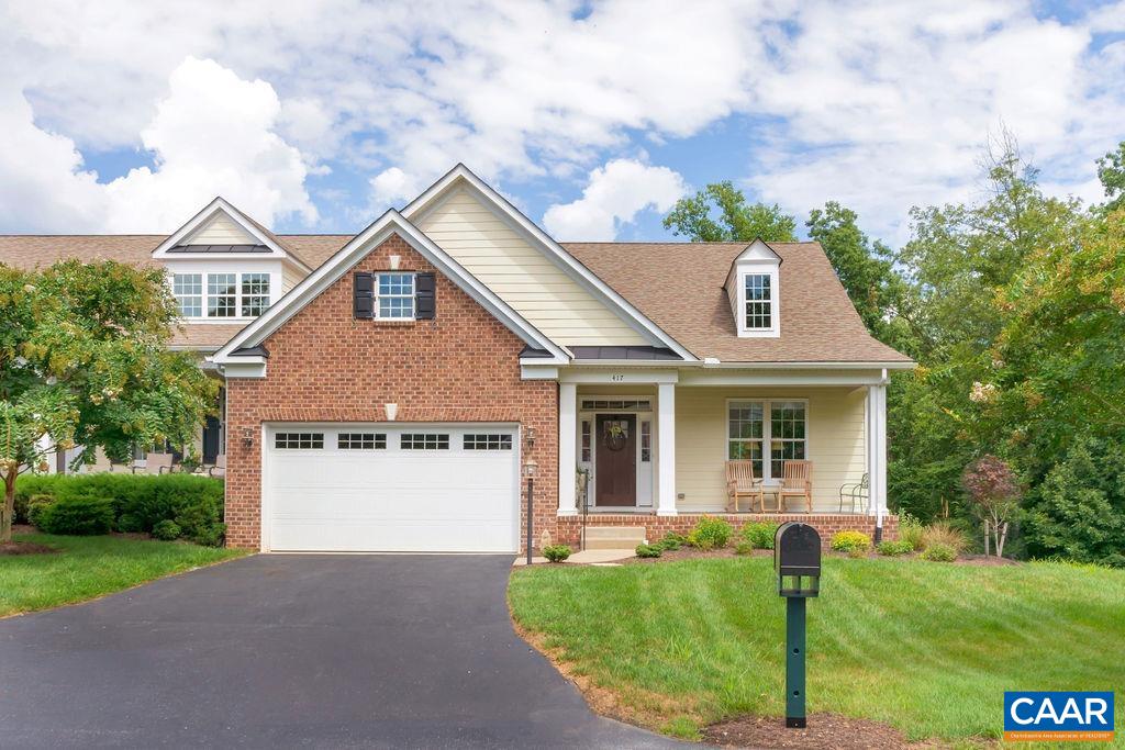 This is ONE-LEVEL LIVING at its best! Don't miss this rare opportunity to live in Dunlora Gates, a lovely 18-villa maintenance-free community w/ delightful neighbors, tucked away yet just 10 mins to Downtown Charlottesville. This pristine END UNIT sits on a quiet cul-de-sac overlooking serene common area from the deep front porch, back deck (w/ gas line for grill) + many windows. 2-CAR GARAGE enters into side hallway w/ cubbies, powder room + walk-in laundry room. Built in 2013, the modern OPEN FLOOR PLAN boasts a fantastic flow, elegant crown molding, tray/9' ceilings + more. WHITE GOURMET KITCHEN feat. granite counters, island, breakfast nook + cozy den. Spacious FIRST-FLOOR OWNER'S SUITE completes the main level. Upstairs inc. a sizable loft for office/crafts/TV + 2 private bedrooms w/ full bath, perfect for guests. Walkout basement provides so much potential: Rec room (gas fp), full bath, storage, workshop. TING fiber internet avail. So much to love!