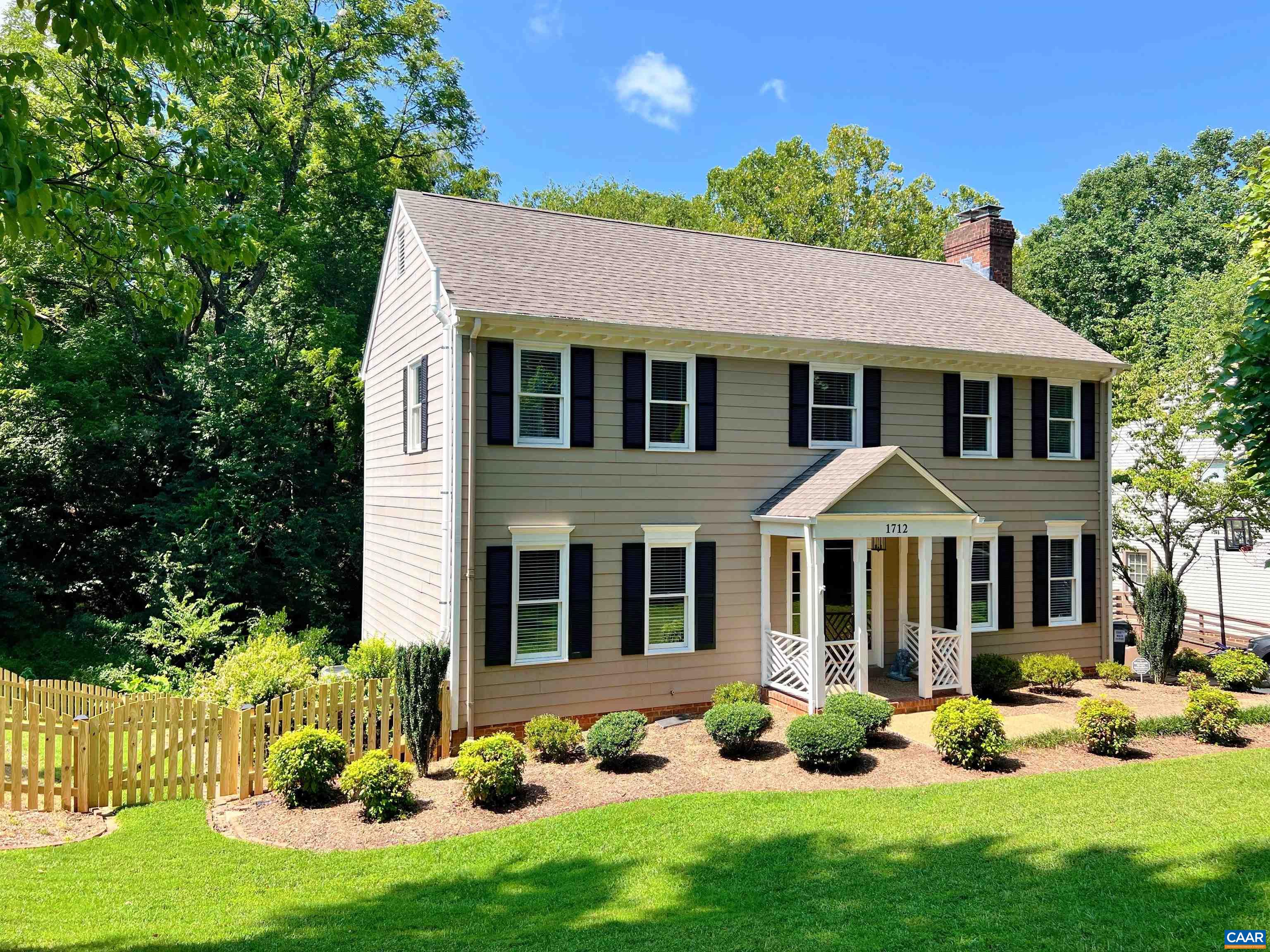 Shows like a model home! Sun filled rooms, open concept spaces, several living and dining areas which allow everyone to be together or have separate space to work, play, or zoom. Screened porch with ceiling fan overlooks tranquil back yard and HOA's common ground with creek. Located convenient to Downtown, 29-North, dining, shopping and major employers in and near Charlottesville. Five distinct bedrooms -- 4 on the 2nd floor, and the 5th bedroom (which could be a Home Office) is in the Terrace level. Many recent improvements. In 2021: American Standard Heat Pump (9 year Warranty remaining) and Hardie Plank siding. In 2022: new wood fence, new carpet, new LVP (basement), new window blinds, new interior lights, new radon mitigation system, new exterior locks, freshly painted (all except two rooms), driveway sealed and chimney cleaned. Priced to sell now -- don't miss out!