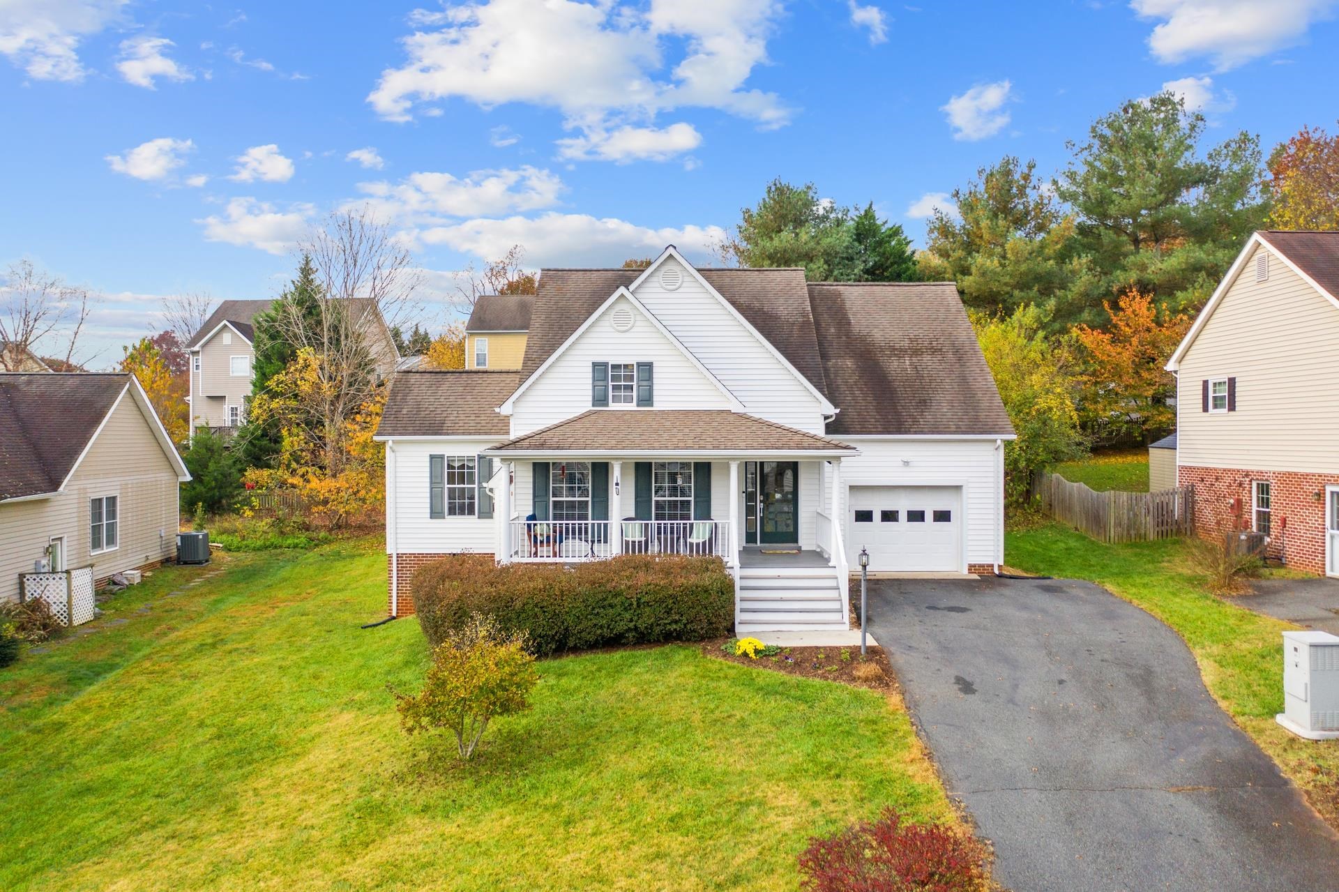 Under Contract, Open House Cancelled! Come on by and you'll be welcomed by the large front porch and naturally relaxed as you open the stained glass front door into the most spacious of the home's 3 living areas! Under that cathedral ceiling and in front of that fireplace and  is the perfect place to prop up your feet and ponder your next move. If it's nice out, you can catch the sunset on your west-facing, maintenance-free deck. If not, there's always the friendly upstairs Bonus Room. Of course, eventually you'll relax in the generous first-floor Owners Suite; with lots of space for furniture, a large WIC and even an attached Home Office! The Home Office has it's own entrance and may be able to be used for a home business. The kitchen has been elegantly updated with granite, newer S/S appliances, an oversize sink and gleaming new hardware! You'll be amazed at how much storage space exists in the upstair knee wall closets and in the conditioned, stand-up crawl space. Super-close (see map) to the community lake, trails, playground & pool (with food truck visits:). And you'll also love how close you are to Wegmans, 5th St Station, I-64, UVA, Biscuit Run Trails, Azalea Park. etc. Active Facebook community group!