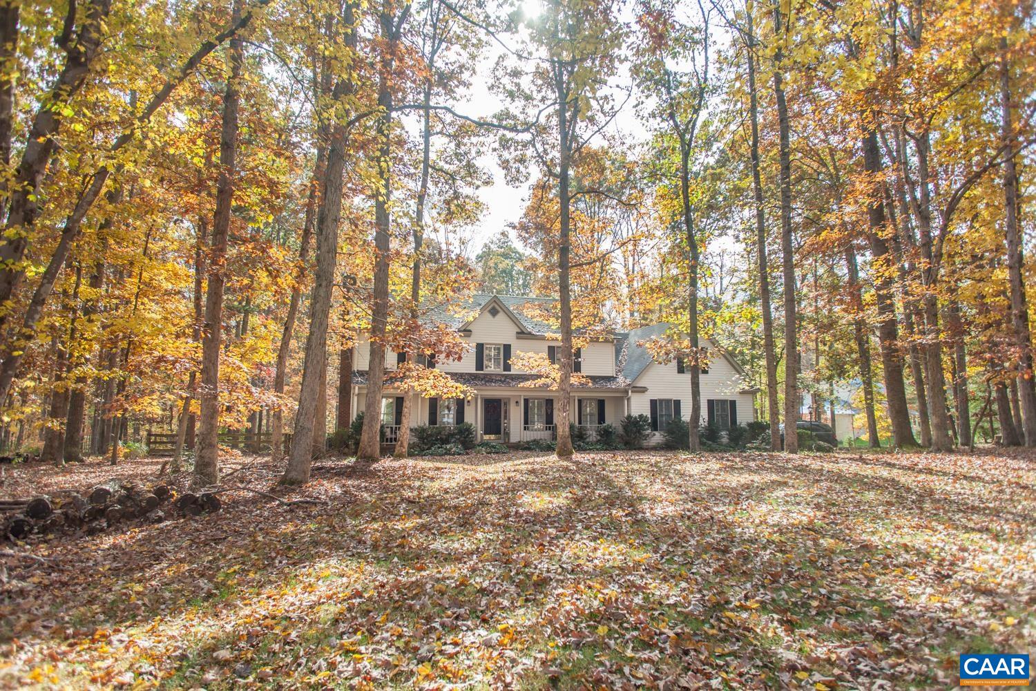 Well-maintained, spacious home in sought-after Garth Road area! Situated on an impressive, 2-acre corner lot in a quiet neighborhood, you’ll be delighted by the privacy & outdoor living spaces this beautiful property provides. Step inside & find hardwood floors & plantation shutters throughout the main level. A large formal dining room, cozy sitting room, powder room, & updated kitchen w/ granite countertops & additional dining area. The open concept family room includes coffered ceilings, a gas fireplace & access to the screened porch, perfect for cooking while entertaining guests. Off the kitchen, is the laundry closet, access to the garage, & access to the oversized deck. The 2nd level features a unique master suite that includes a private tucked away office, a sitting room w/ cedar closet & access to the private balcony, & two separate bathrooms for the shower & jetted soaking tub. Down the hall are 3 additional bedrooms w/ large closets & another full bath. You’ll find plenty of desirable features such as multiple skylights & storage space throughout. The landscaped, fenced backyard is open & flat, allowing plenty of space for entertaining & play! A short drive to shopping & dining at Barracks Road and UVa. No HOA dues!