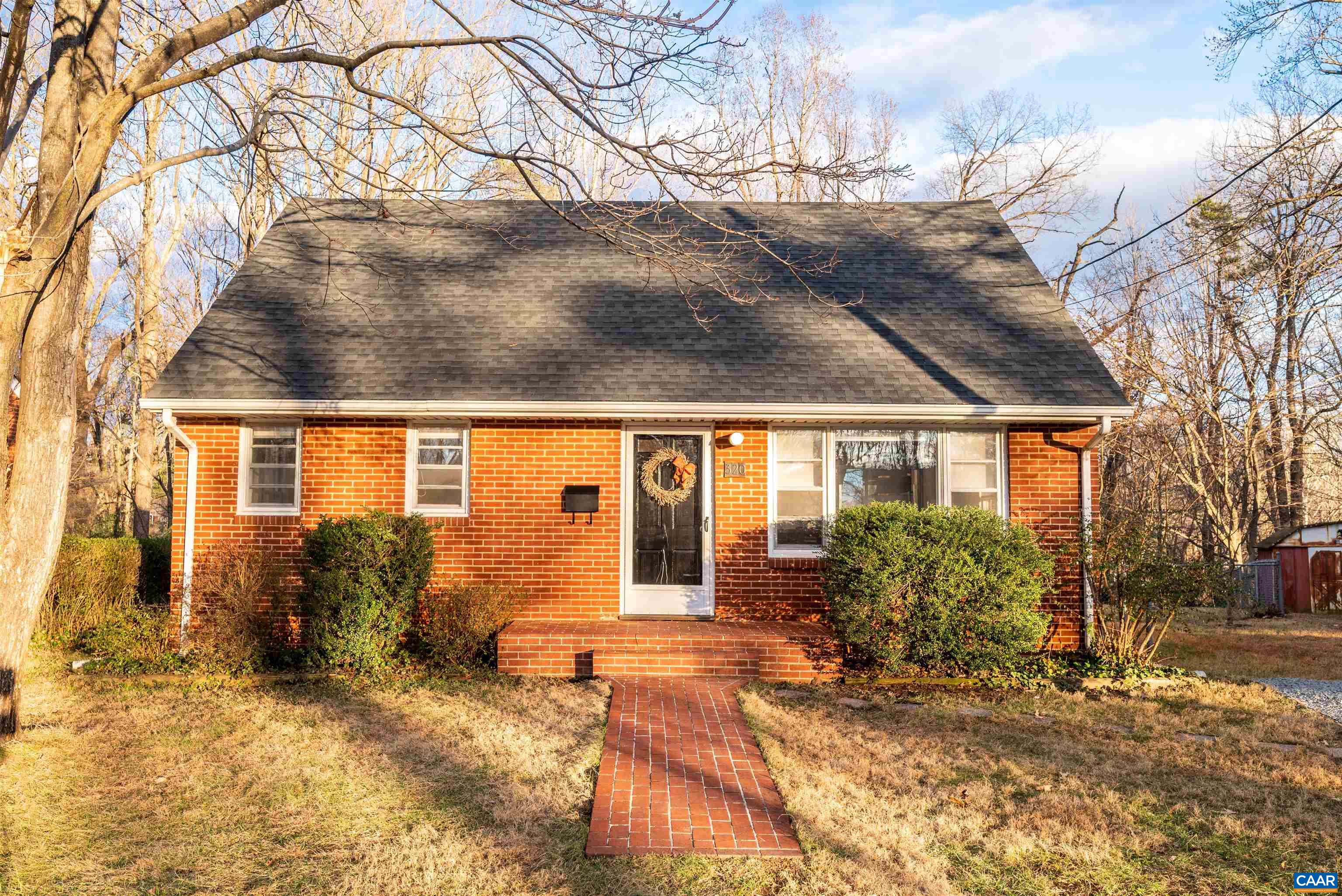 Charming 3BR, 2 full BA brick cape-style bungalow located on the cul-de-sac of one of the most popular neighborhood spots in Fry's Spring. Great proximity to UVA Grounds and Medical Center, Fifth St Station Shops including Wegmans, Downtown Cville and I64. Around the corner from Azalea Park playground & dog park, close-by Fry's Spring Beach Club, short walk to Scott Stadium & popular local restaurants. Main level features welcoming living room and an updated eat-in kitchen, complete with custom floor-to-ceiling cabinetry, gas cooking and lots of windows. The kitchen opens onto a spacious patio and nearly-level rear fenced yard. Two bedrooms & updated full bath with tub/shower complete the main level. Second floor features the primary bedroom and second full bath with soaking tub/shower. The walk-out/up terrace level features a spacious finished bonus room and room to expand into the unfinished space that is home to the washer & dryer and storage. Current owners have been wonderful stewards focused on long-term improvements. Among the most recent updates: 30-yr architectural shingle roof (2021), new basement windows (2022), water heater (2018), and newer appliances.