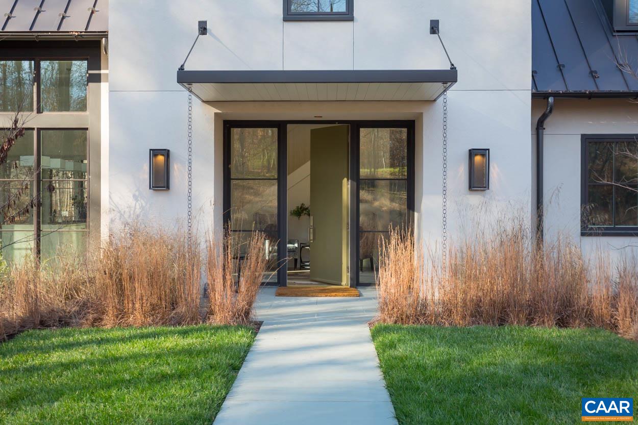 Elegant design and inspired architectural details balance with function to deliver a stunning contemporary home in Keswick Estate. A thoughtfully crafted floor plan features main level master, laundry room and study along with spacious secondary bedrooms upstairs. The open-concept with double height great room and entry hall transitions seamlessly between the indoor and outdoor spaces. Beautifully sited on a 2 acre parcel just off the golf course the Keswick Contemporary that exemplifies quality design and craftsmanship.