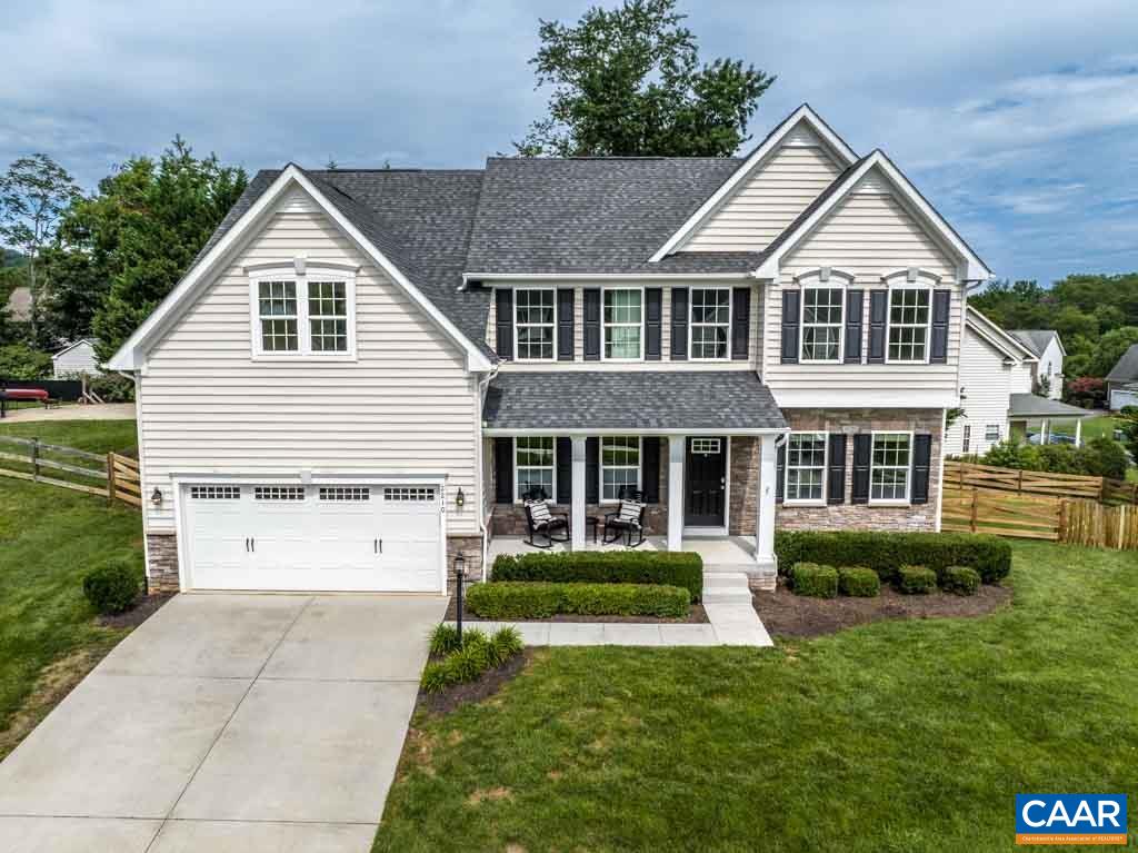 This well-maintained, 2015 Colonial is one that you don’t want to miss, priced at less than $700k! Recent exterior landscaping done (see pics 50-54)! Set on a corner lot in peaceful & desirable Grayrock West, this home has everything you could want. First floor includes an open kitchen, dining and living area, as well as a breakfast nook and two rooms which could either function as an office/study. This house offers not one, but two master bedrooms! Basement includes a large rec room and a side room perfect for that DIYer. Plenty of storage space is available in the basement utility room or the two car garage. Owners have recently invested into various upgrades including, fresh paint, high end stain resistant carpet, new light fixtures, ceiling fans, and more, making this home completely move-in ready. Other notable features include a gas fireplace in the large living room and dual zoned heating/cooling. Set on a ¼ acre lot, the fully fenced-in backyard offers the perfect space for grilling and entertaining. Just 25 min to UVA and all of the shopping/dining in C'Ville, and a couple miles from downtown Crozet.
