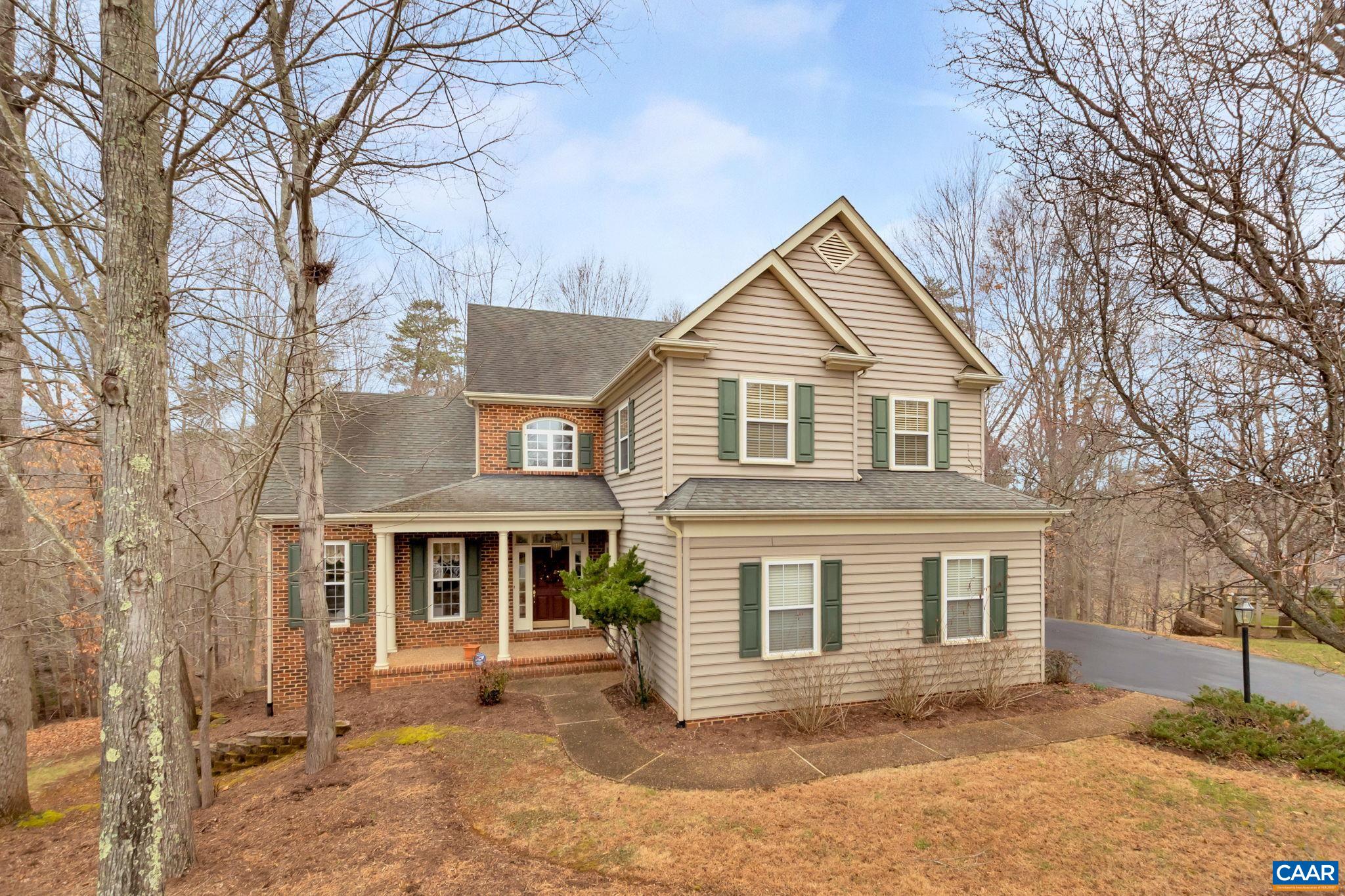 Private five-bedroom home in cul-de-sac setting surrounded by six acres of wooded private common area overlooking Paine's Lake. Open space perfect for family gathering or entertaining accented with hardwood flooring, built-in bookshelves, recessed lighting, gas fireplace and private forest views from every window. Chef’s Dream Kitchen includes Granite surfaces, Wood Cabinetry, Stainless Steel Appliances, Samsung microwave & dishwasher and convection oven for baking and roasting all upgraded in 2021. New Waste King garbage disposal installed in January 2021. Terrace level has been designed to be a second living space with private entry with slate floor entry, one-bedroom and full bathroom with pocket door & large family room with sliding glass doors that lead to a spacious exposed aggregate patio. Downtown Charlottesville and CHO are 10 minutes away and shopping, dining, and recreational activities are within a five-minute drive. Still Meadow community offers private swim and tennis club along with the meadow and hiking trails along the Rivanna River.