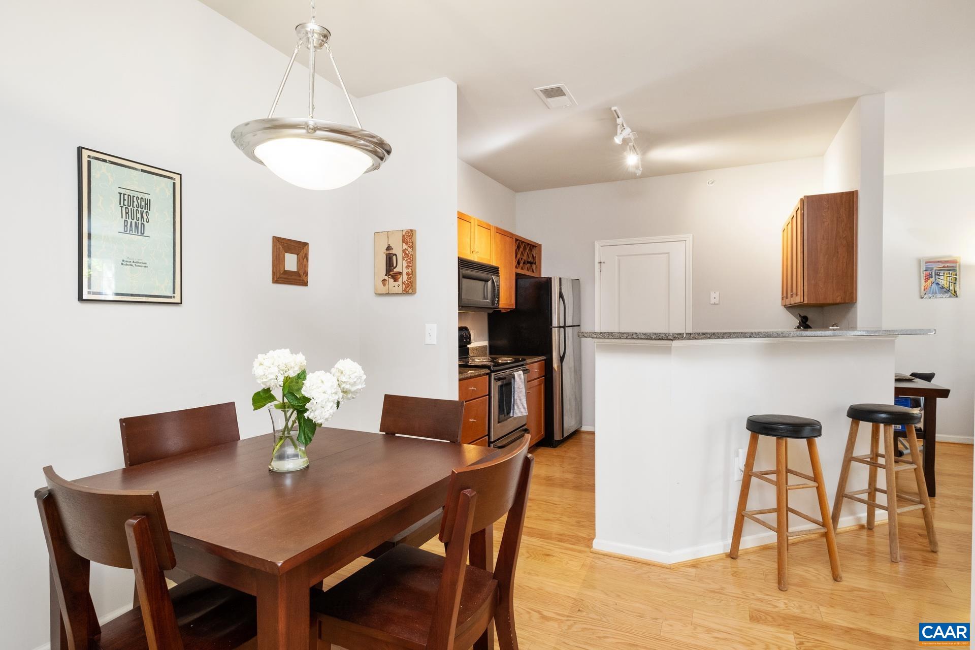 Centrally located GROUND LEVEL condo in the desirable Walker Square neighborhood--just steps away from the best that West Main Street has to offer! This 1 BR/1BA condo features a ZERO-STEP ENTRY, HARDWOOD FLOORS throughout, and GRANITE countertops in the kitchen. Take advantage of the amenities, including a pool, clubhouse, and fitness center! Walker Square Condominiums offers maintenance-free living in the middle of C'ville--less than 1 mile to UVA grounds, UVA Medical Center, and the Downtown Mall!