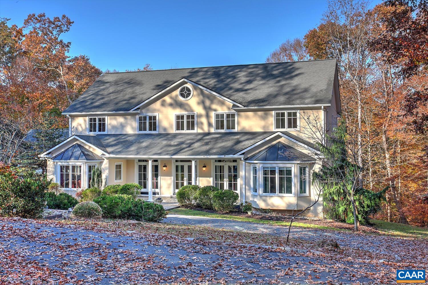 Bentivar is ideally located in Albemarle County on mature spacious lots. This 7,000+ square foot home features 6 Bedrooms, 5 Full and 2 Half Baths. The Grand curved staircase, archways, columns, dental molding, built in cabinetry & woodworking throughout are easy to impress.  Main level bedroom suite attached to formal office. Wraparound decking and massive screen porch overlook your private 2+ Acres.  Tremendously large eat in kitchen flows to the 2nd Staircase.  The upper level features 3 bedrooms, plus a Master Suite with a private sitting room, balcony & double closets.  The Unfinished Walk Up 3rd Level is ready to be whatever you can imagine! All this house on a finished walk out basement... what more can you want!