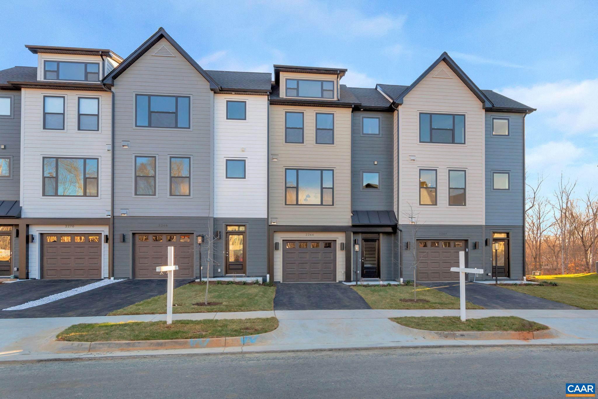 COMPLETE HOME ACTUAL PHOTOS This Bainbridge interior townhome features 3 BR, 3.5 bath, flex room/office, & attached garage. A thoughtfully designed open floorplan includes spacious great room w/ fireplace, dining & kitchen w/ oversized 9' island, gas cooking, chimney hood, granite counters & painted maple cabinetry. An oversized TREX deck backs up to green space & mature trees for relaxing evenings, morning coffee, and outdoor entertaining. Belvedere is an established community centrally located to all things C'ville, just 2 miles to the Downtown Mall & RT 29 shopping, 5 miles to UVA, surrounded by nature& the Rivanna Trail. LAWN CARE, TRASH, SNOW REMOVAL, & TING FIBER internet included in HOA. All homes are 3rd party tested for energy efficiency & come w/PEARL GOLD certification. Similar Photos.**UP TO $6000 IN CLOSING COST CREDIT WITH PREFERRED LENDER, SEE CONSULTANT FOR DETAILS.**