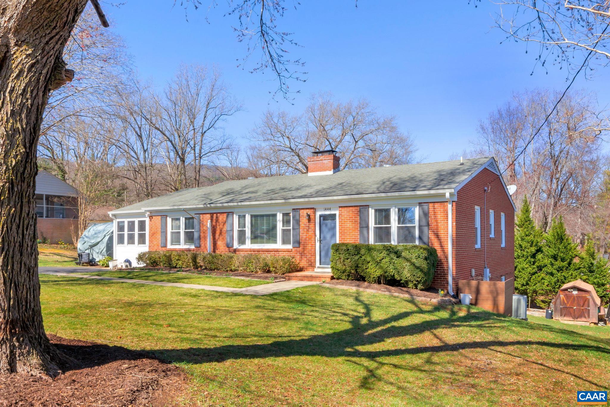 Renovated brick ranch home in popular and convenient Laurel Hills in Crozet. Perfectly renovated and expanded kitchen w/ quartz counters, stainless appliances, and timeless finishes. The kitchen extends into what used to be an unfinished sunroom and is now finished space looking out onto the backyard and large expanded deck. Recently refinished hardwood floors throughout main level, family room w/ wood burning fireplace, and a separate dining room. Three main level bedrooms including a primary bedroom w/ attached en-suite bath. Main level sunroom is currently used as a home gym. Full basement includes a huge rec room w/ another wood burning fireplace, a newly remodeled full bath w/ tile surround shower, and an expansive unfinished space with painted concrete floors. Large yard w/ storage shed (newer roof) and playset. Additional improvements include a brand new roof (in progress), new outlets throughout, newer windows. No neighborhood covenants or HOA fees. Walk to the local elementary school, downtown Crozet, local coffee shops and restaurants, and the Crozet library. Western Albemarle schools. Convenient to all things Charlottesville & UVA.