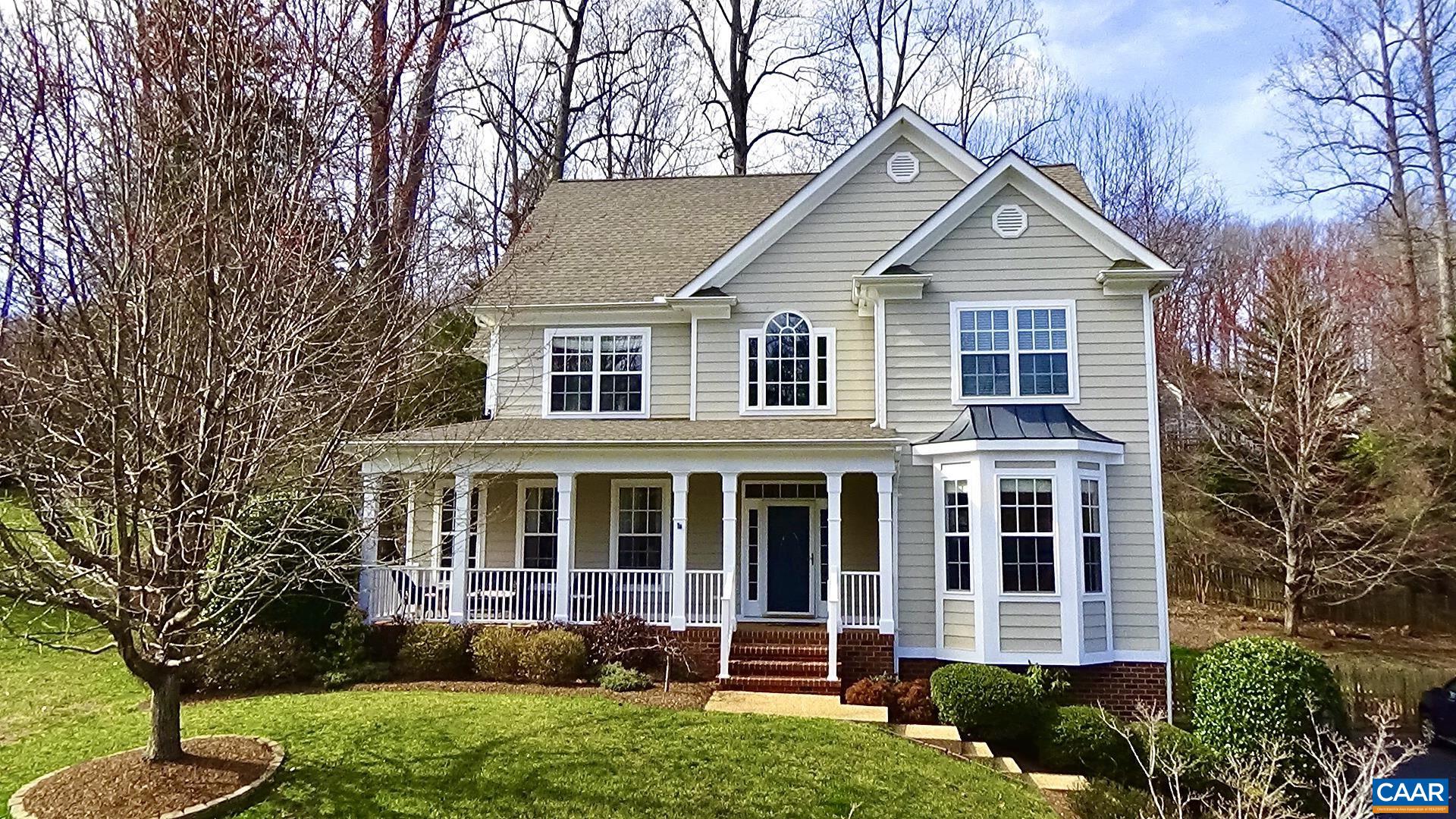 Beautiful Mosby Mountain home on quiet cul de sac.  Hardwood flooring, 9 foot ceilings, more windows than average allowing enormous amounts of natural light to flow and provides very private wooded and elevated views.  Open floor plan, 4 beds, 2 full baths, 2 half baths.  Large garage and basement area. Large back deck leading to mature and landscaped back yard featuring rock work, paths, tree swing and fire pit.  Front covered porch is great for entertaining and elevated views as well. Fantastic location only minutes from 5th Street station shopping, interstate, downtown mall, UVA and Walnut Creek Park.