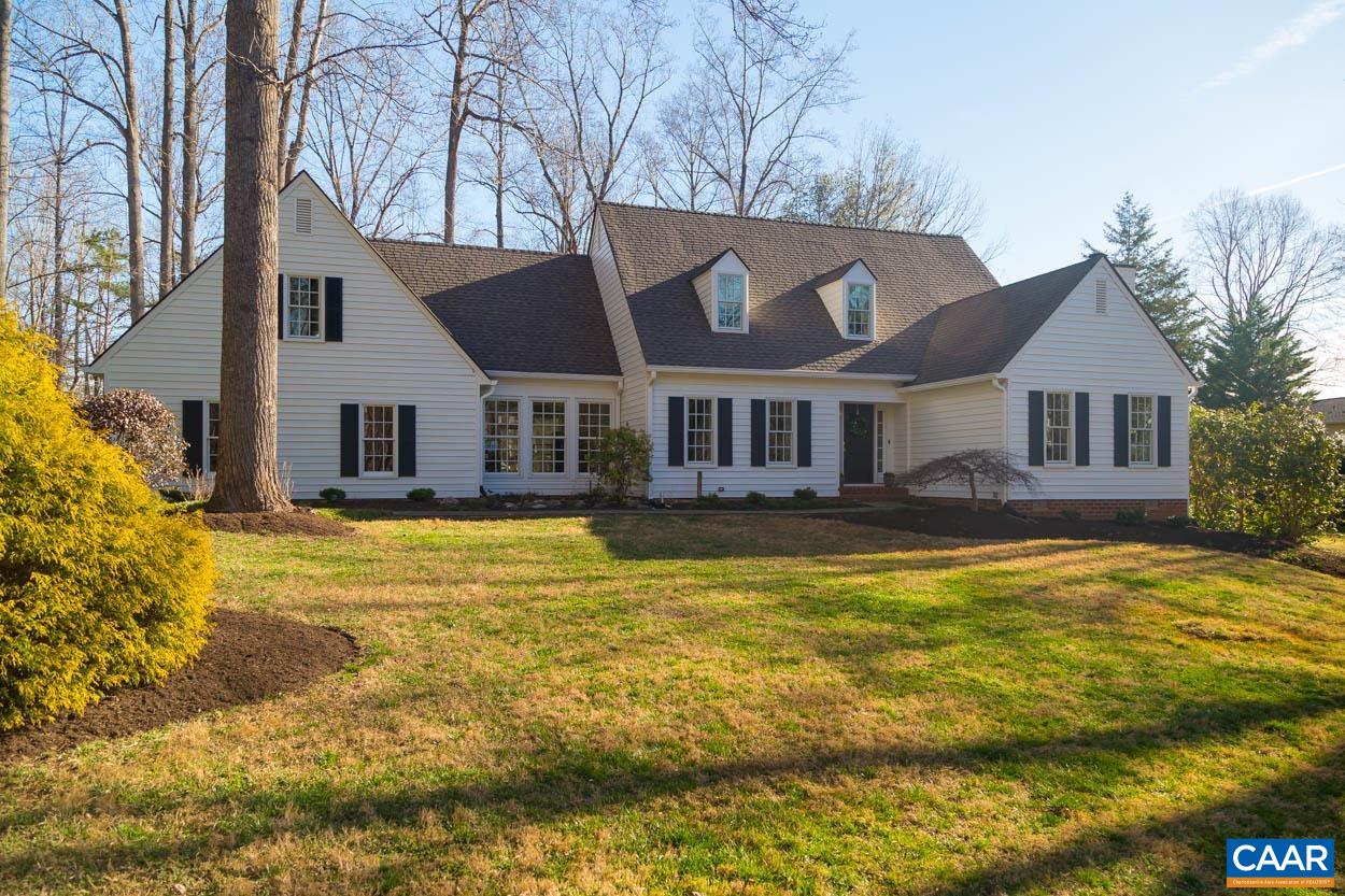 1525 Old Oaks Drive is an idyllic Cape Cod with a versatile floorplan that offers a variety formal and informal living/gathering spaces with a layout that fits the needs of the everyday routine. The 4 bed 3.5 bath house sits on a gorgeous elevated lot at the end of a cul-de-sac in the sought after Ivy Oaks Neighborhood. Wide plank heart pine floors span from the front entry hall and dining room through the kitchen and living room. The home features a well-appointed primary suite on the first floor, along with 2 additional bedrooms and a large guest suite upstairs. The updated kitchen with custom cabinets extends across a casual dining area and living room that both open to an expansive rear deck and lovely backyard. Entry from the 2 car garage, leads through an oversize mudroom/drop room with slate floors and built in cubbies.  The mudroom also provides outside access and a back staircase to the finished bonus room. Located in the heart of Ivy, just across from Meriwether Lewis Elementary and surrounded by a neighborhood trail system, the property features numerous updates including both HVAC units, and new Pella windows.