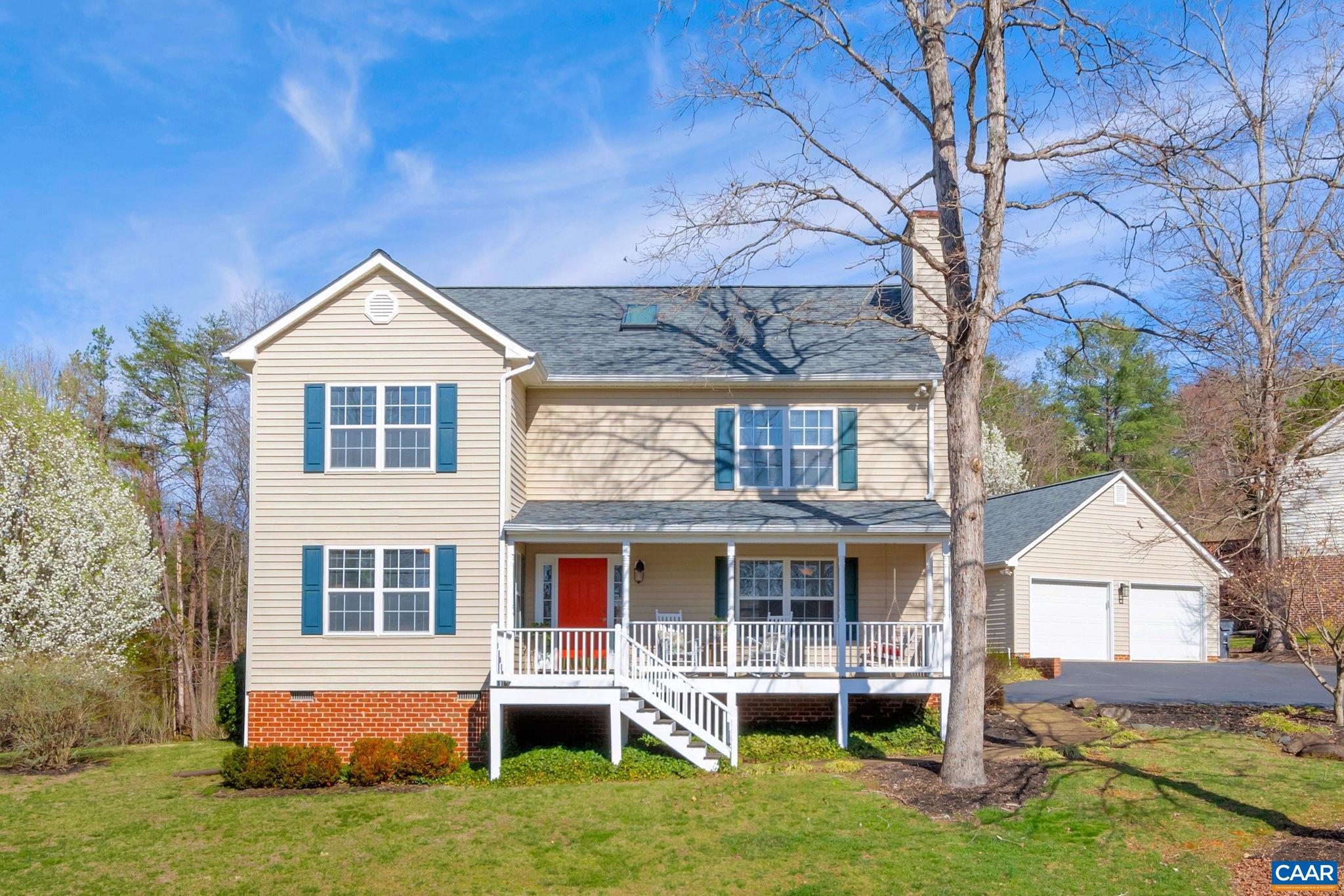 Fantastic neighborhood offers pool, tennis, trails and just 4.5 miles to DT, UVA and even shorter to Wegmans, Interstate 64 and Biscuit Run Trails. Home offers 4 bedrooms on second level, true hardwoods throughout, updated kitchen with granite, stainless gas range, dishwasher, granite counters and a large walk in pantry/ laundry room.  Family room offers a gas stone fireplace and opens to kitchen. A HUGE garage with separate extra room for a workshop, kayak storage, bikes, with plenty of parking on the wide, paved level driveway. Large front porch with SW sunset views, porch swing(conveys) as well as a back deck for entertaining, relaxing. Backyard is LEVEL and fenced and has many areas for gardening, a fire pit as well as offers a garden/tool shed. BRAND NEW ROOF on garage and house.