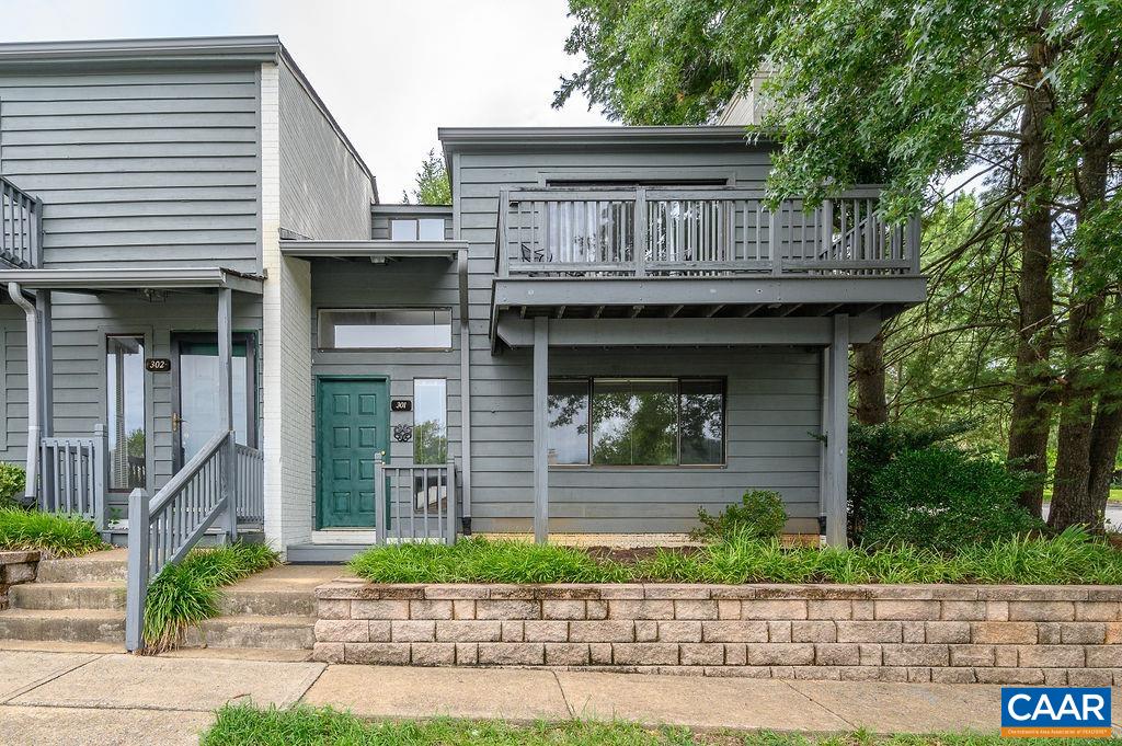 Ideal location convenient to UVA, Darden Business, Law and JAG Schools, two well respected country clubs, shopping and restaurants. This end unit home is in move in condition! The first floor includes a dramatic two story foyer with painted white brick accent wall, living room with wood burning fireplace, dining room and kitchen open to a cozy family room. Off the family room and kitchen is a private patio.  There will be no fighting over bedrooms in this home because the second floor has two master bedrooms with attached master bathrooms.  A second floor balcony enjoys distant mountain views. The neighorhood is beautifully maintained and residents get to enjoy a private pool on hot summer days.