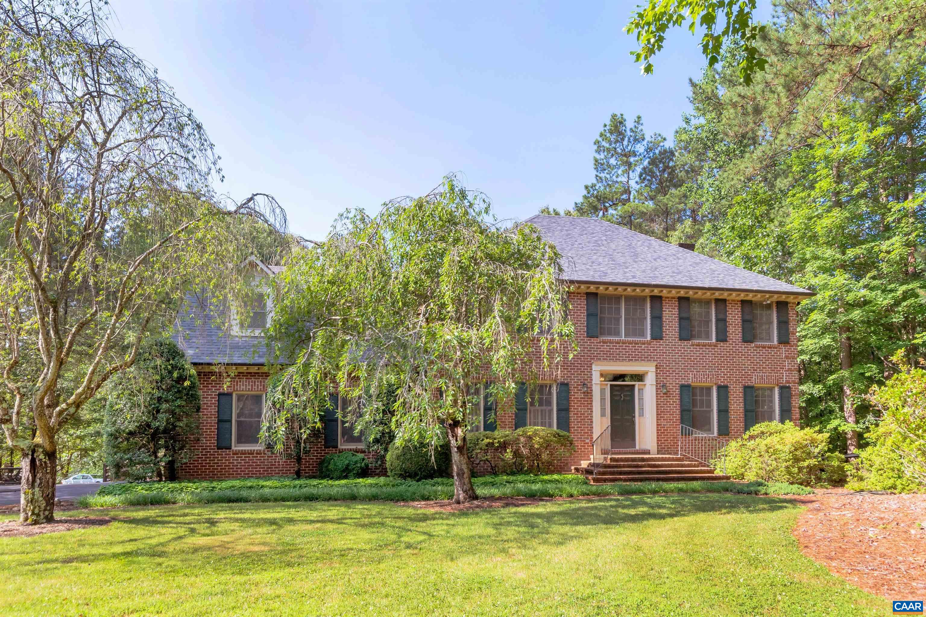 This Stately Brick Home sits on 3.4 Private Acres in the heart of Ivy and Meriwether/Western School District, yet only 10 minutes from town. This Quality 5 Bedroom home boasts Beautiful Hardwood Floors throughout the 1st and 2nd levels. The Spacious Master Suite has a Tray Ceiling & Walk-In Closet and the Master Bath has a Dual Vanity and a Sky Light. The Generous Great Room opens onto a Screen Porch and Deck overlooking the Park-like Backyard and Pool. Enjoy cooking in the Inviting Kitchen with Center Island and Double Oven. The Huge Finished Walkout Basement is a combination Family Room, Exercise Room, Rec Room and has a Murphy Bed for extra guests! This roomy house has plenty of space inside and out! The Partially Fenced yard has beautiful Garden Spaces, a Pool, Tree Fort, Fire Pit, and plenty of Acreage to enjoy Nature, including a path through the woods down to the creek that borders the property.  Recent updates include Complete Exterior Paint (2022), most of the Interior was also Painted (2022), New Pool Liner (2021), Driveway was Resurfaced (2021) & Sealed (2022), Refinished Hardwood Floors (2021), New 50 Yr Architectural Shingle Roof (2019).