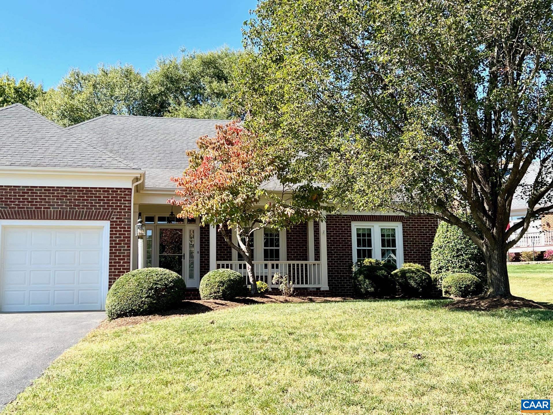 Sought after BAXTER COTTAGE HOME. Fantastic open plan with 3 bedrooms on the MAIN LEVEL. All new PELLA windows, Enormous 10' X 20' sunroom with wall of windows and access to back deck. Formal Dining room has a bay window and the spacious family room has a wood burning fireplace. Freshly painted kitchen, sunroom and master bath. Entire exterior of home just power washed. Wonderful spacious brick floored front porch.  Both the back deck and screened in porch face the private Cottage park.