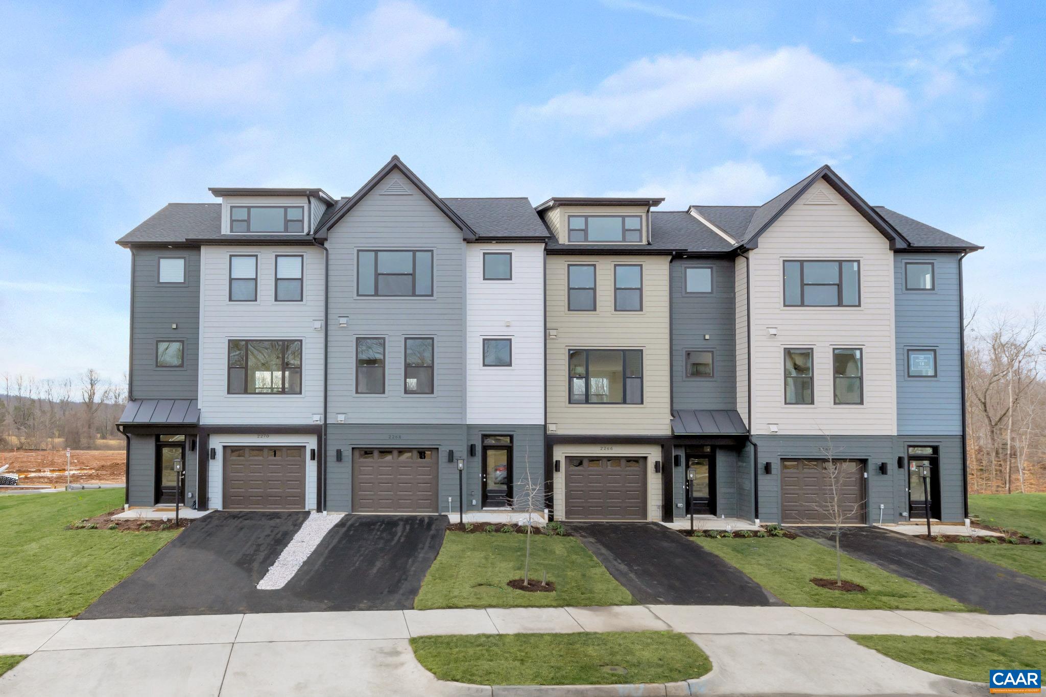 COMPLETE HOME ACTUAL PHOTOS.  This Bainbridge interior townhome features 3 BR, 3.5 bath, flex room/office, & attached garage. A thoughtfully designed open floorplan includes spacious great room, dining,& well-appointed kitchen w/ oversized 9' island, gas cooking, chimney hood, granite counters & painted maple cabinetry. An oversized 8’ X 20’ TREX deck backs up to green space & mature trees for relaxing evenings, morning coffee, & outdoor entertaining. Belvedere is an established community centrally located to all things C'ville, just 2 miles to the Downtown Mall & RT 29 shopping, 5 miles to UVA, surrounded by nature & the Rivanna Trail. LAWN CARE, TRASH, SNOW REMOVAL, & TING FIBER internet included in HOA. All homes are 3rd party tested for energy efficiency & come w/PEARL GOLD certification. **UP TO $6000 IN CLOSING COST CREDIT WITH PREFERRED LENDER, SEE CONSULTANT FOR DETAILS.**