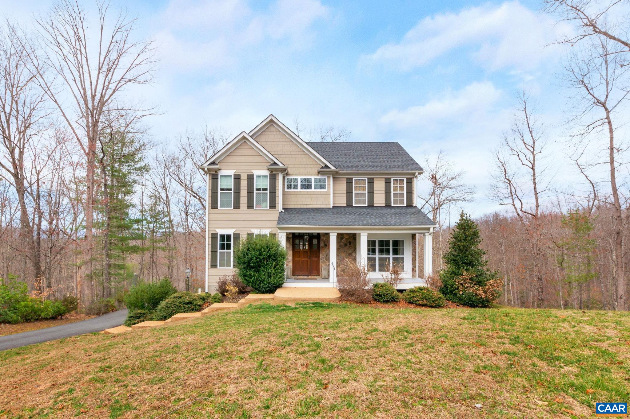 This move-in ready newer home in Ivy has been impeccably maintained & features all of the modern features of a newer home in a well established neighborhood. Main level highlights include open concept living, kitchen w/ gorgeous granite counters, stainless appliances & ample cabinet space. The entry greets you w/ a two story foyer, off of which is a flex room w/ built-in shelving that is currently used as an office but could also be a formal sitting room or playroom and on the other side a formal dining room. The backside of the home is full of windows exposing the mountain views & letting in tons of natural light. Family room includes a gas fireplace w/ a stone facade that extends to the ceiling. Upstairs, the primary bedroom has a gorgeous en-suite bath w/ a tile surround shower, large soaking tub, granite counter, & huge windows to take in the mountain views. There are three secondary bedrooms, laundry, & a hall bath w/ dual vanities & a sliding door to the tub/shower. Lower level includes a spacious mudroom coming in from the driveway or garage, a finished rec room w/ sliders to a back patio, and a full bath. The lot backs to the Mechums River and owners built steps all the way down from the house to the river.