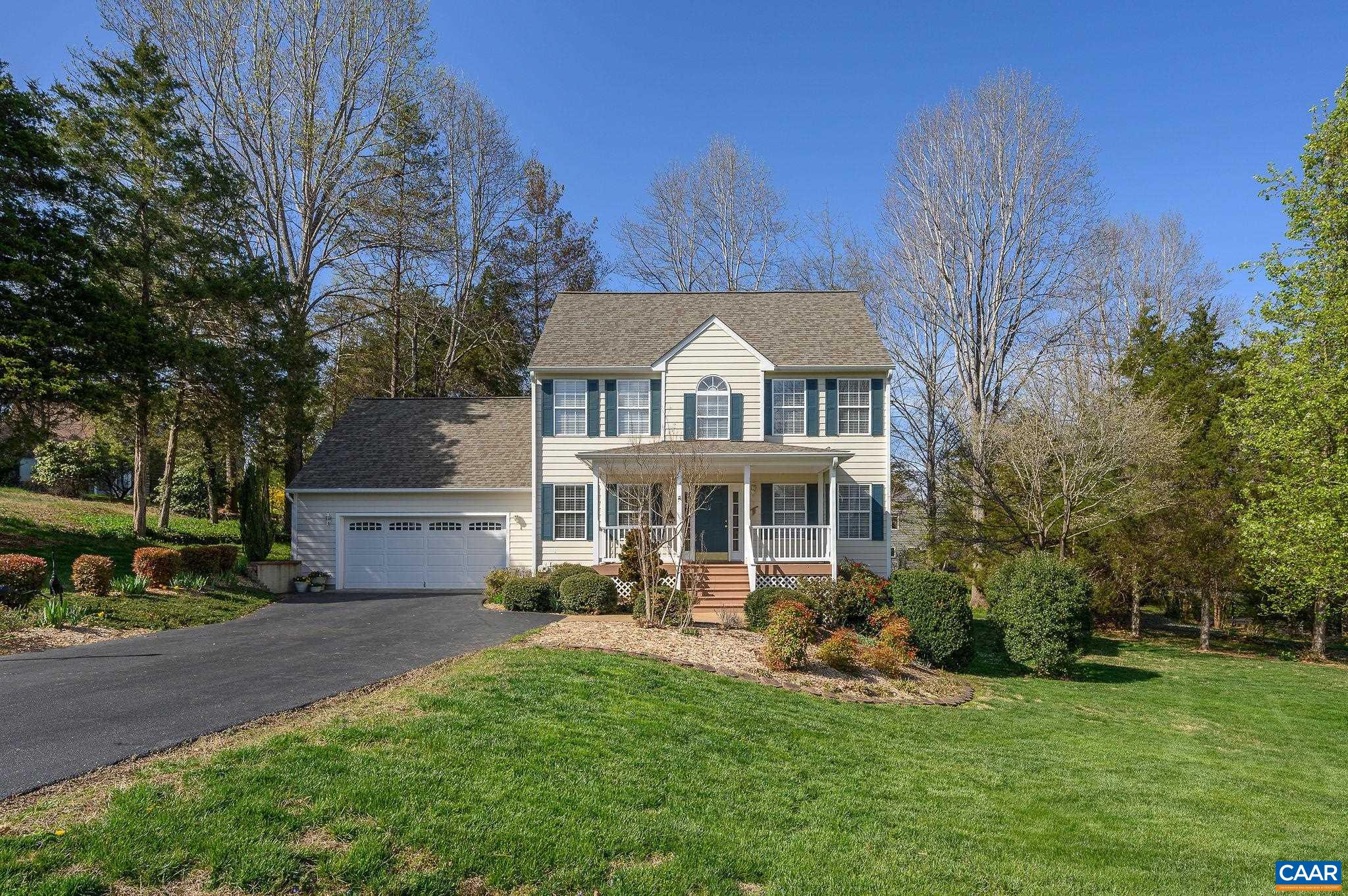 Classic 4-bedroom Colonial just 3 miles to UVa & Downtown sits on a nearly ½ acre, cul-de-sac lot in amenity-filled Lake Reynovia. This home lives large with a thoughtful layout that  features a main level with home office, formal dining, half bath, open living room w/ gas fireplace, and eat-in kitchen that walks out to the garage for easy unloading.  Upstairs you’ll find an expansive primary suite with soaking tub and shower, full hall bath, two spacious bedrooms and a sunny foyer overlook. The finished basement includes a large rec room that walks out to a covered patio, fourth bedroom with attached full bath, and laundry/storage room. There’s even a walk up, floored attic that spans the width of the 2-car garage and could be finished and opened to the top floor for an even larger primary suite, nursery, or secret room. The roof, hot water heater and a/c are all less than four years old as well! This summer walk to the pool & tennis courts during the day and enjoy quiet evenings grilling on the peaceful back porch.