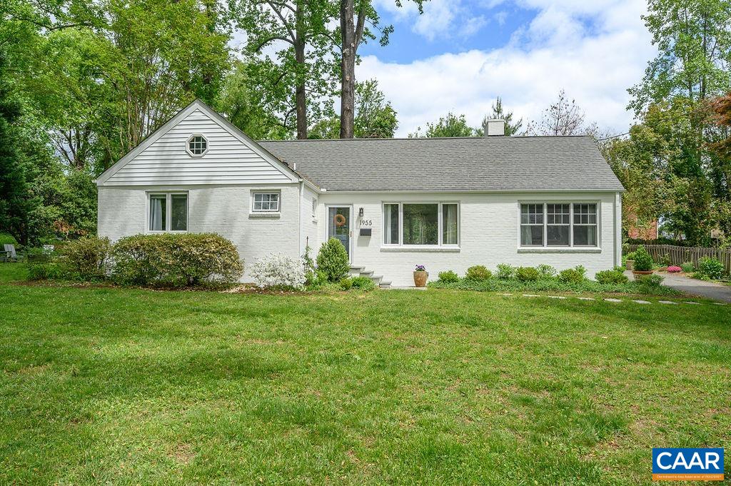 Reimagined, renovated, 3 BR, 2BA charmer is nestled on one of Charlottesville’s loveliest streets in the highly desirable Lewis Mountain neighborhood. Current owners transformed the one-level home in recent years -delivering timeless & tasteful improvements while preserving 1950s appeal. Original hardwood floors throughout, wide trim, solid wood doors, handsome wood burning FP, and a wonderful, open floor plan that eases from one room to the next. Oversized windows allow for ample natural light. Remodeled kitchen features smart design, high-end stainless appliances, classic white cabinets, quartz counters & breakfast bar- and is adjacent to a fantastic mudroom/laundry/pantry. Both Primary & hall baths have been comprehensively revamped w/ Carrara marble, custom tile, new fixtures & hardware. Almost 1/3 acre yard is landscaped and lovely- with plenty of space to garden, play, or entertain on the private, backyard patio.  This delightful, turnkey city home is perfect as-is; or offers a rare opportunity to expand on an easily accessible and level lot. You'll appreciate your walkable lifestyle - and love being steps to the O-Hill trails, The Rotunda, JPJ, Scott Stadium, Alumni Hall, & UVA medical center. 4 off-street parking spots too