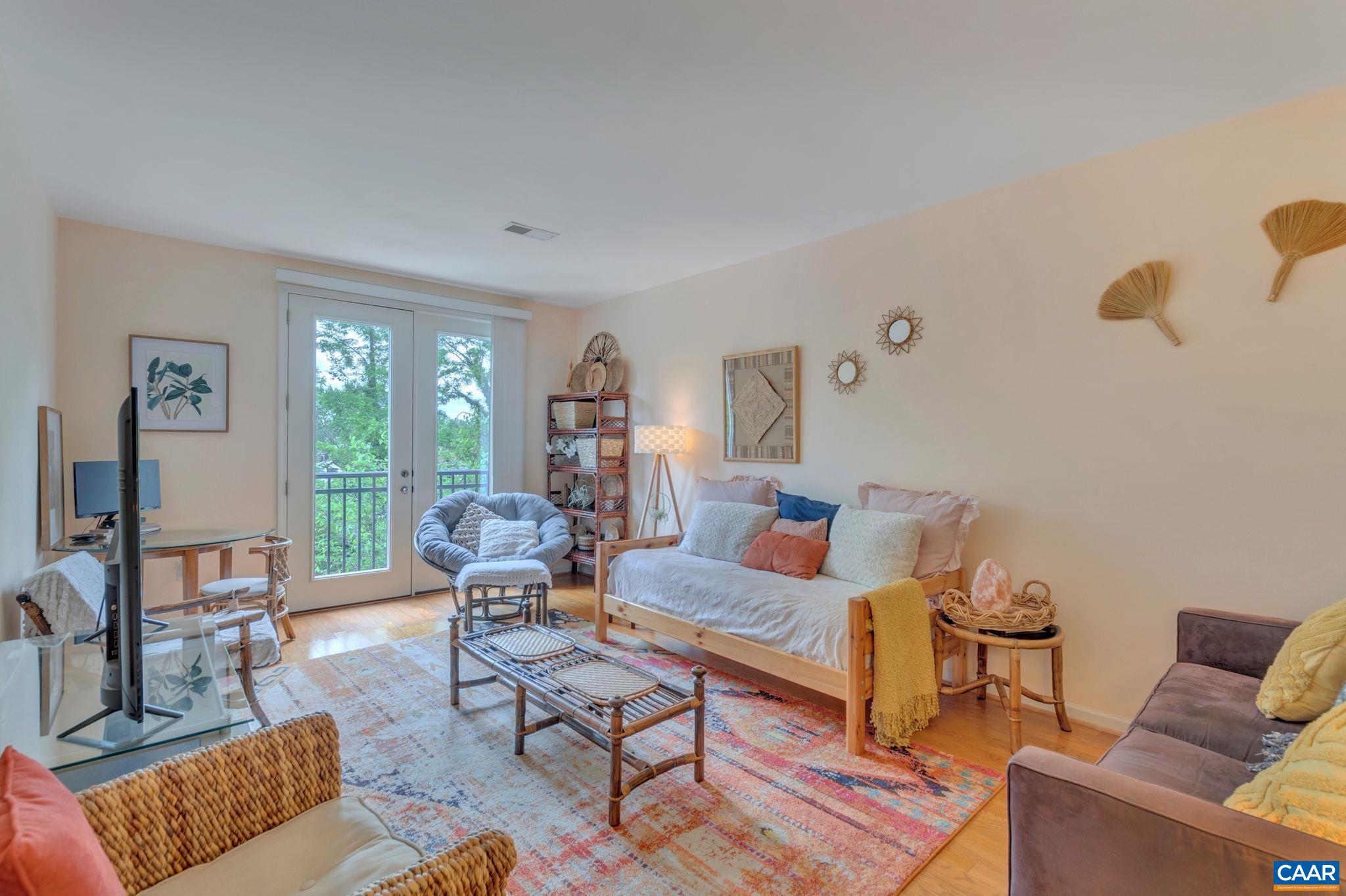 South facing light filled Walker Square "Grand" 1 BR unit with 9' ceilings, wood floors, well maintained, large bedroom and huge walk-in closet. New HVAC and hot water heater 2022. Walk to UVA Hospital, Grounds, West Main St and Downtown. On City trolley line. Immediate to restaurants, cafes, bakery, butcher, Feast market, and more. One flight of stairs, across from large workout gym. Dog park in neighborhood. HOA includes internet, all exterior maintenance, pool, fitness center, clubhouse, trash and snow removal. Amazon Hub package lockers on site.