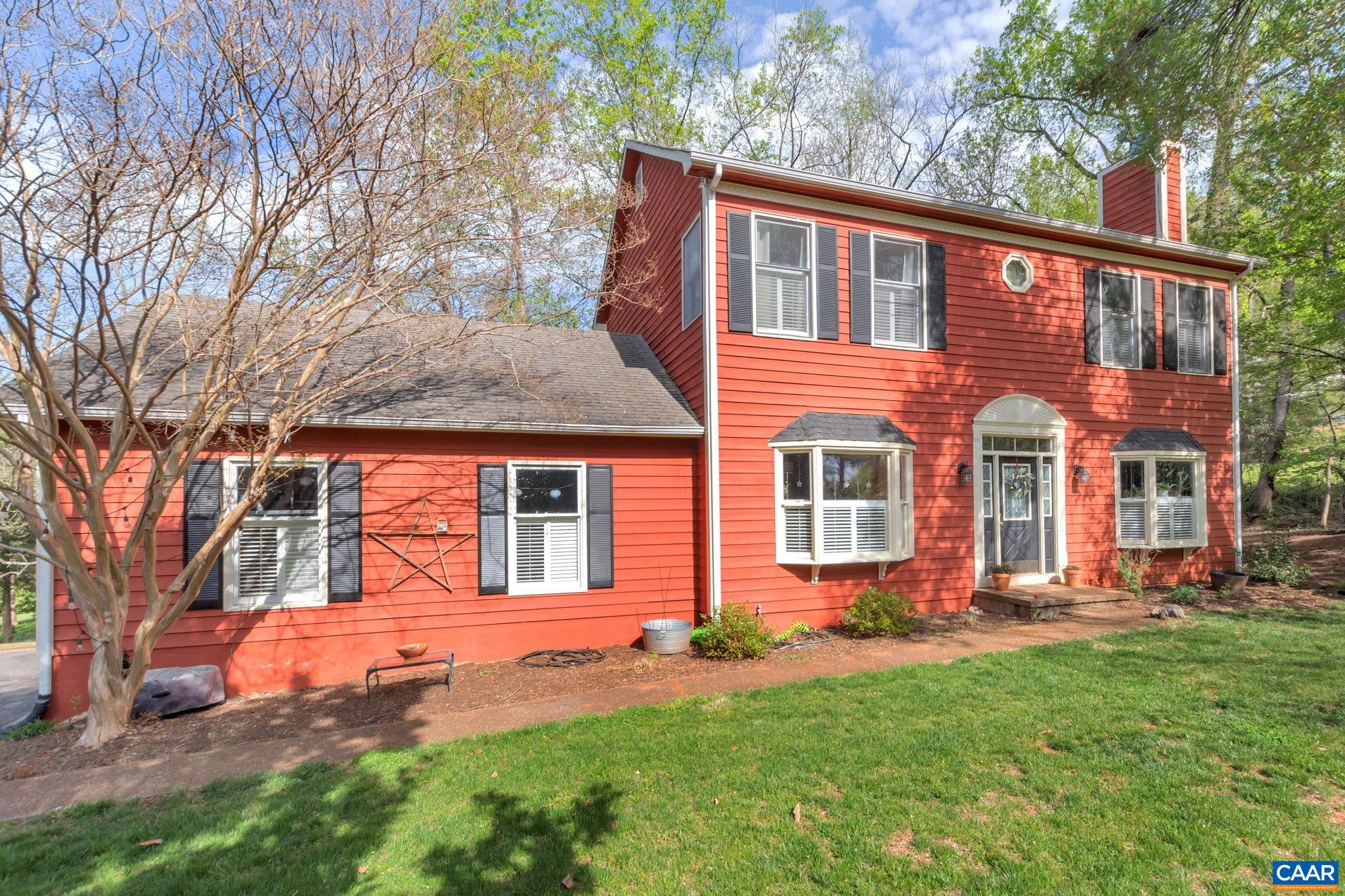 Well-maintained cedar sided Colonial on a beautiful lot in Peacock Hill.  This 4BR/2.5BA home was built in 1994 and includes over 2000 feet of finished living space, almost an acre of yard, paved driveway, large rear deck, mature trees and plantings, and a 2-car garage.  On the first floor are a living room w/FP (currently used as dining room), a dining room (currently used as music/guest room), a comfortable family room, powder room/laundry, and a spacious kitchen with quartz countertops and recently upgraded appliances.  Upstairs are 4 bedrooms, including a large Master, and 2 full baths.  This is comfortable home in a very desirable Ivy location.  Murray/Henley/WAHS schools.  Very convenient to Charlottesville, great neighborhood with large lots, plenty of trees, community pond, and much more.