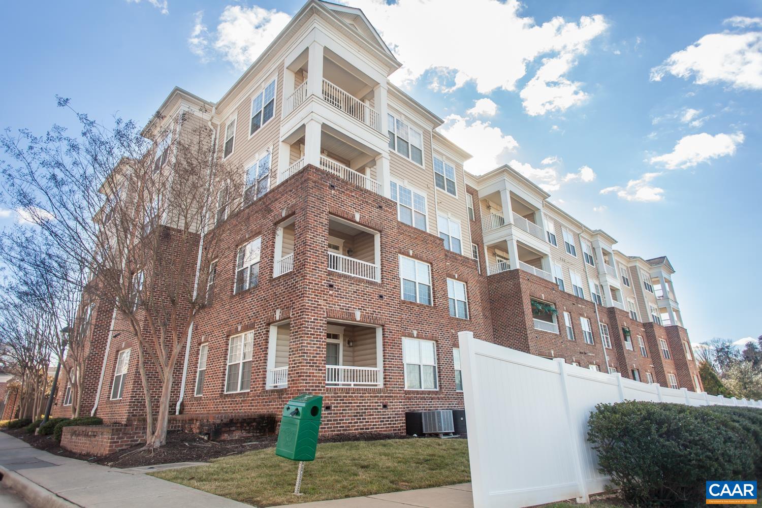 Spotless, low maintenance condo convenient to all things Charlottesville! This beautiful home boasts gleaming hardwood floors, an impressive kitchen with cherry cabinets, granite counters, stainless steel appliances, gas range, and a large kitchen island. Off the kitchen you’ll find a dining area with access to a cozy balcony, living room, and half-bath. Down the hall, you’ll find 2 bedrooms, a full bath with tiled tub and dual sinks, and the laundry closet. At the end of the hall is an oversized master bedroom with new carpet, a large walk-in closet and a cozy nook, perfect for a sitting area or small home office. Enjoy relaxing on the second private balcony located off the master bedroom. The en-suite bath includes dual sinks, a soaking tub, and tiled shower. Brand new furnace in 2021! An assigned parking space and secure storage area located in the underground garage. HOA includes area/exterior maintenance, trash, snow removal, pool, fitness center, and play area. Located with quick access to Rt. 29N & Rio Rd and a short drive to shopping, dining, and more!