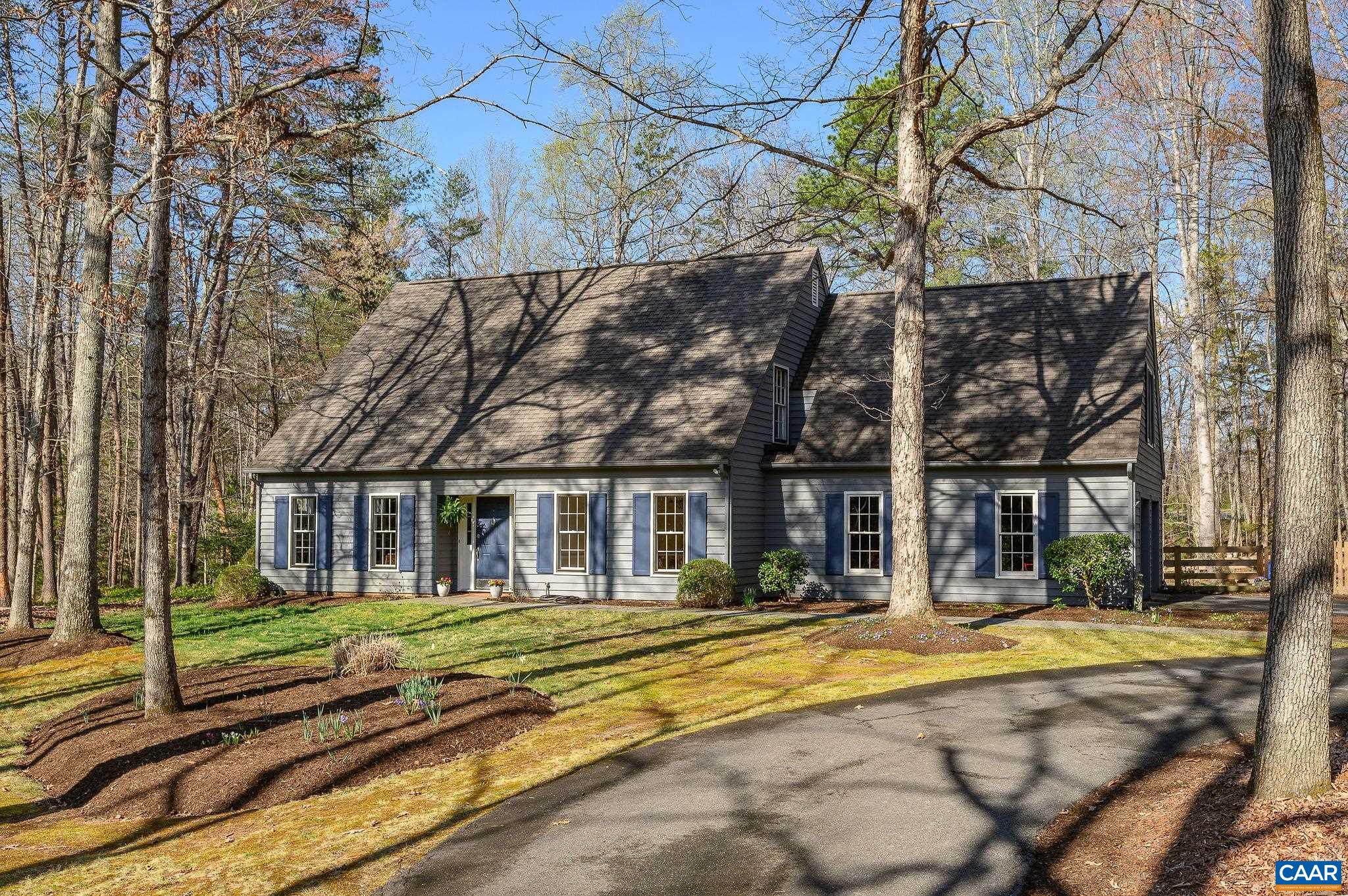 Charming, updated Cape Cod in picturesque Ivy neighborhood is move-in ready and just a hop, skip and jump to Meriwether Lewis Elementary. The well-maintained sophisticated, 4BR/2.5BA home’s countless attributes include a beautifully updated kitchen (Marble Counters, new appliances, Shaw farm sink), comprehensively renovated bathrooms and a functional, flexible floor plan. The main level features hardwood floors, updated lighting, custom trim/shelving and an open flow- with family room open to kitchen and breakfast area. Tastefully finished formal dining room and living rooms are easily opened to casual living areas, or separated by glass French doors for privacy. You’ll find brand new carpets, fresh paint and a bright, contemporary feel in the 3 sunny bedrooms  and bonus room (4th BR) on the 2nd level.  Primary suite bath is stunning with glassed walk-in shower, custom tile and double vanity.  Plenty of space to stow your stuff in the large 2-car garage, oversized closets (with custom built-ins) and eaves storage. The almost 3 acre yard is a nearly-level with grassy fenced lawn bordered by woods to allow for privacy- perfect for bonfires, games and picnics. All outdoor enthusiasts will delight in access to walking & biking trails.
