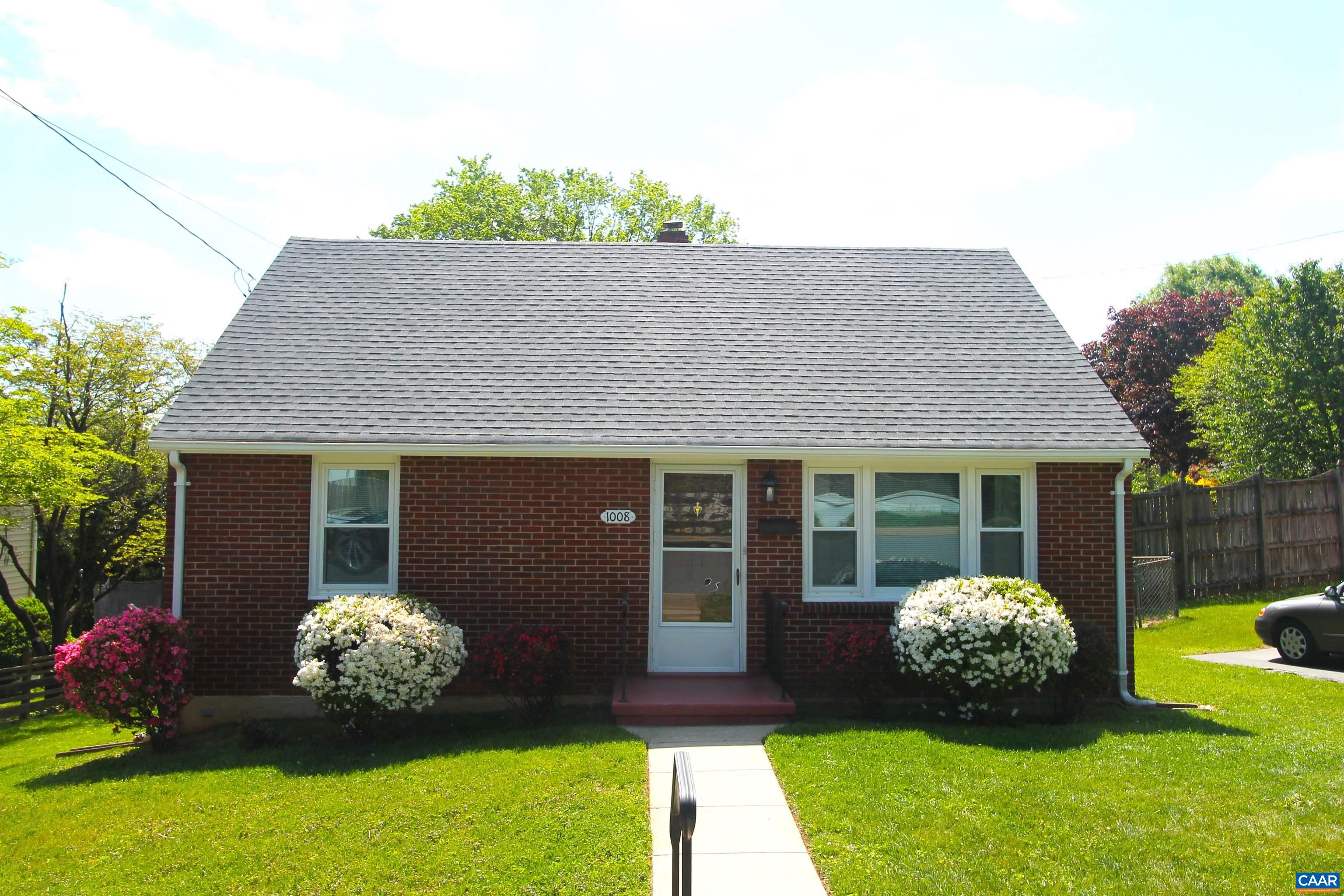 Adorable brick bungalow in the convenient city neighborhood of Locust Grove. Built in 1955, this home has been lovingly maintained by the original owner.  The home features a living room, kitchen, full bath & 2 bedrooms on the first floor, a finished bonus room(bedroom?) in the walk-up attic along with unfinished attic space for storage or more finished space.  The walkout basement features a finished family room(bedroom?) & unfinished space for the washer/dryer,laundry sink & additional storage. Immaculate hardwood flooring to go along with recent improvements including a Gas Furnace 2020, New Roof 2019, Replacement Windows & New water line to street. Fenced, level backyard with a garage style shed & off street parking complete this wonderful opportunity to live in "North, North Downtown" a short walk or drive to the downtown Charlottesville area.
