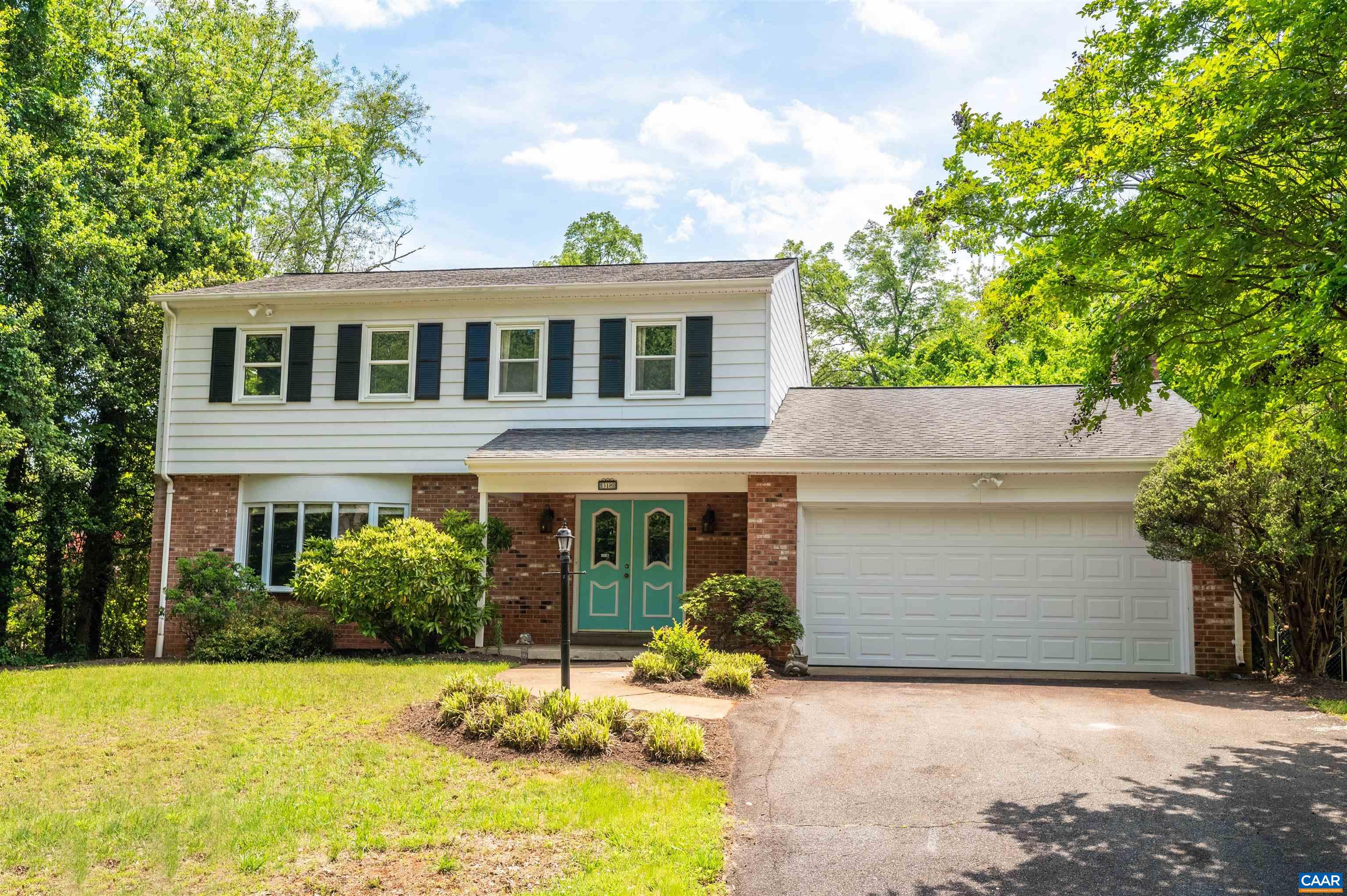 This RECENTLY UPDATED 5 bed 3.5 bath, 2913 fin sq ft home features a SEPARATE ENTRANCE BASEMENT 1-BED 1-BATH APARTMENT with a full kitchen, stacked washer/dryer, and BRAND NEW LVP FLOORING throughout! Enjoy gorgeous HARDWOOD FLOORS on the first and second floors, thoughtful BUILT-INS, a spacious SUN ROOM with skylights and backyard access, picturesque living room GAS FIREPLACE, and attached 2-CAR GARAGE! Prepare meals in the RENOVATED KITCHEN featuring endless countertop space, light maple cabinets, recessed lighting, stainless steel appliances, and RAISED BED GARDEN views and rest easy in the SPACIOUS PRIMARY SUITE! Allow your pet to roam free in the FENCED-IN private backyard while relaxing on the SUNNY BACK PATIO! Enjoy being CONVENIENTLY LOCATED within walking distance to Woodbrook Elementary, 8 minutes to Ivy Creek Foundation, and 15 minutes from UVA, the hospital, and the historic Downtown Mall! Open House SUN 5/21 11AM-1PM!