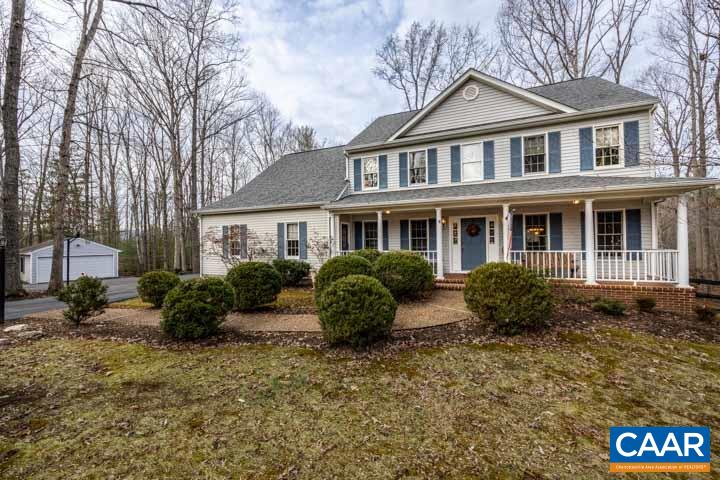 New Price! Welcome to Hickory Ridge in the Earlysville / Free Union area of Albemarle Co. Tucked at the end of Shagbark Ln, on 2+ acres, you will love the privacy and convenience of this large, beautiful, traditional home. With 4000+ sq ft living space, find 4/5 bedrooms and 4 full baths. The 2nd fl owner's suite offers tile shower, dual vanity, walk in closets and jetted soaking tub. There are 3 ample bedrooms w/Jack and Jill hall bath up. Enter living level thru an open 2 story foyer & formal living room that leads to dining room with lovely bay window views, perfect to gather and dine. Updated kitchen has granite counters and maple cabinets on tile floors w/black appliances - to include wall oven and down draft cook top on center island. The breakfast nook to family room invites casual meals, access to the 18 x 18 rear deck, sunset views and comfy time in front of the lovely gas fireplace. A home office or bedroom option connects to a full bath on the main level. Hardwoods throughout. Lower level offers a bedroom and full bath, work/storage space and a large rec room with walkout access to the fenced rear yard and adjoining 22 ac wooded preserve. Two garages for cars & equip. Winter Mountain Views. Easy 15 minutes to Cville.