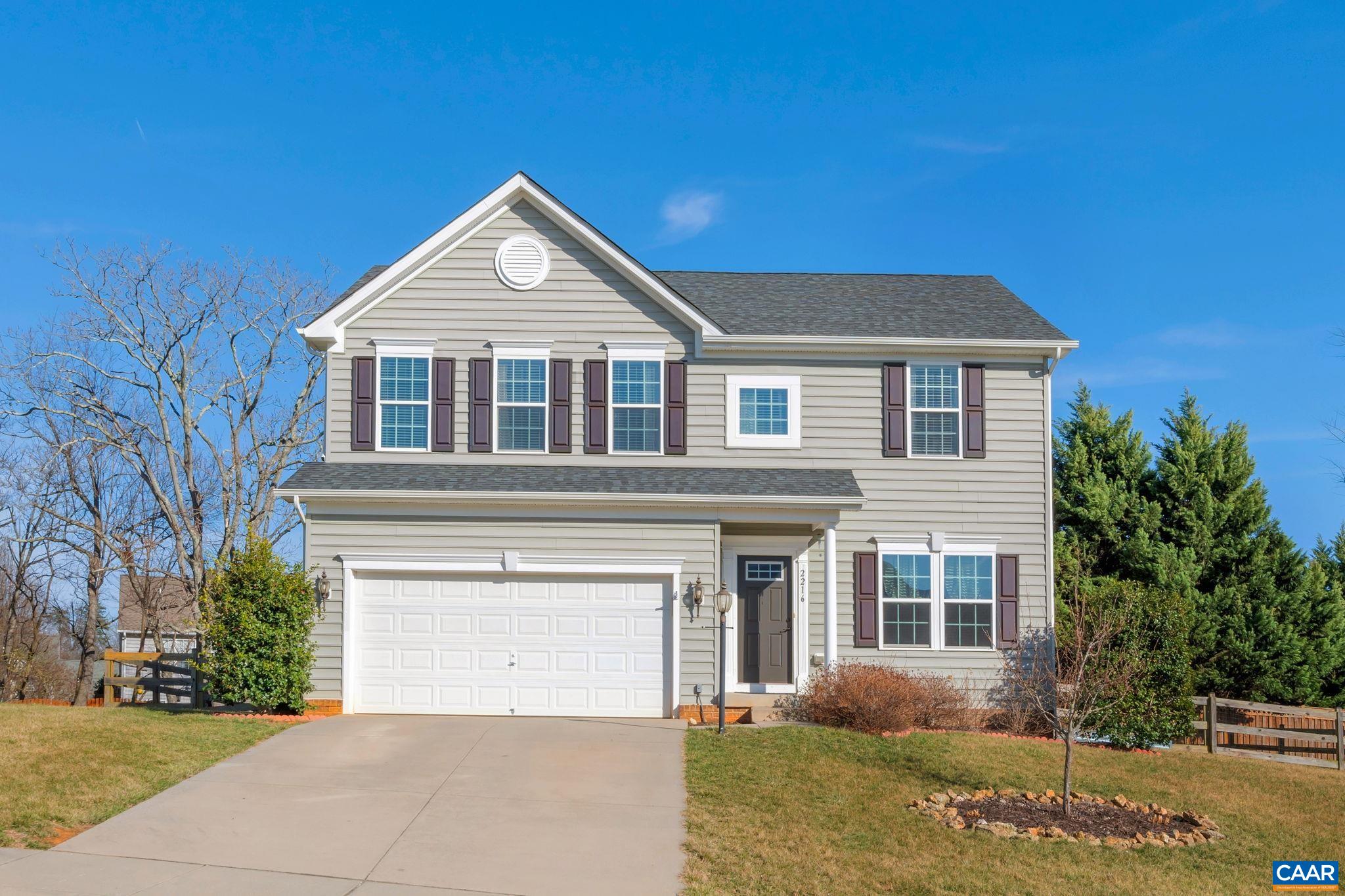 This lovely 4 bedroom Grayrock home has tons to offer, including a mostly finished basement, a 2-car garage, a fenced-in, level rear yard and more! As you enter the home, you're greeted with the living room, half bath, family room with LVP flooring and a fireplace open to the eat-in kitchen featuring granite countertops, ample cabinetry and a breakfast bar leading directly to the vaulted dining area and sliding rear door to access the back patio and yard. Upstairs boasts a generously sized primary bedroom with a walk-in closet and attached bath. Three additional bedrooms, a full hall bath and the laundry room complete this level. The basement includes a rec room, office or exercise space and a half bath, along with tons of storage space. The fully fenced-in backyard with stamped patio offers the perfect space for grilling and entertaining. Grayrock offers walking trails, a pond and two playgrounds with very low HOA fees.