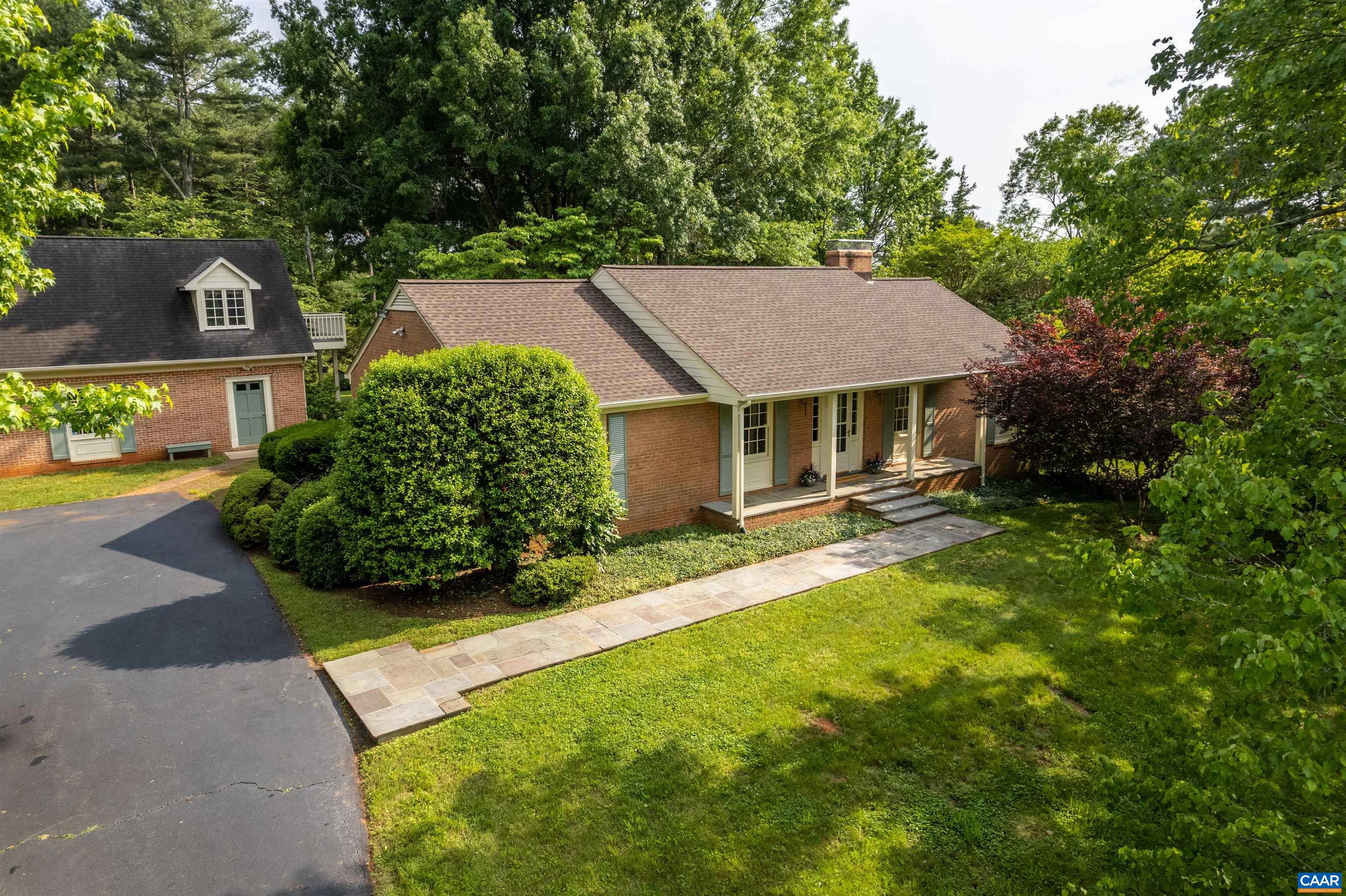 Well-built brick home, on a quiet cul-de-sac in West Leigh. Private hill-top setting surrounded by mature landscaping with large magnolias, maples, oaks as well as specimen crape myrtles and cutting garden.  This lovely home features main level living, original hardwood floors, wood burning fire places, sunny kitchen, and spacious back deck overlooking large open level land suitable for gardening, game-playing, or future pool. Walk-out basement features home office, full bath, family room, and ample storage space. Generous fully floored walk-up attic with two skylights. Detached two-story brick outbuilding contains two-car garage, separate workshop, and second floor with two large unfinished rooms, windows and an outdoor deck. Home is freshly painted inside and out.