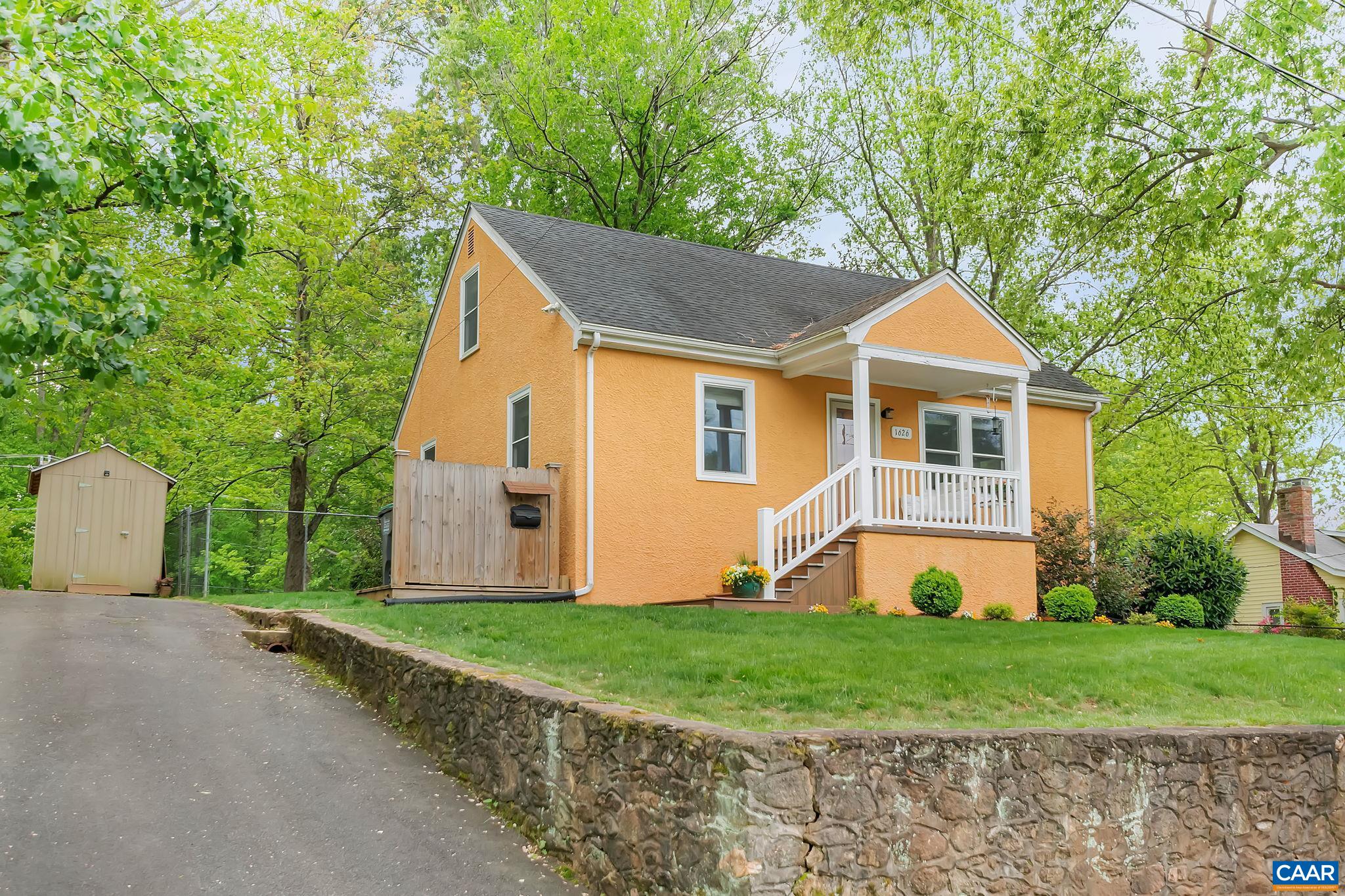 Cheerful single-family home situated on a rare double lot along charming Mulberry Avenue in the popular Fry's Spring neighborhood. Lounge outside on the oversized lot and enjoy the manicured landscaping, large back deck, flagstone patio, garden boxes, custom playhouse, storage shed, and fully fenced back yard. Garden steps lead to Cherry Avenue and a less than 5 minute walk to Johnson Elementary. The bright interior boasts a main level with spacious living room, fully renovated kitchen featuring quartz countertops and all new appliances, entry-level master, full bath, and second bedroom/office. Upstairs includes two additional bedrooms with individual Mini splits for personalized climate control. Oak floors, updated ceiling fixtures, and new double-hung windows throughout. Roomy basement offers flex space with unlimited potential and includes laundry and workshop. Ask your Realtor to see the extensive list of upgrades. Conveniently located just over 1 mile to UVA Medical Center, Scott Stadium, and Fry's Spring Beach Club, and minutes to historic Downtown and 5th Street Station, this sweet home is the perfect urban retreat. OPEN HOUSE SUNDAY, May 7th, from 11am - 2pm.
