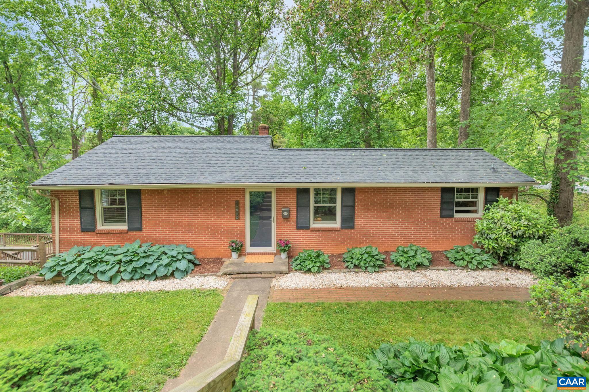 Welcome home! Charming brick rancher in unbeatable location, 7 MINUTES FROM EVERYTHING in the lovely Locust Grove neighborhood north of downtown. Living room, dining area and both upstairs bedrooms have beautiful hardwood floors. Awesome butcher block breakfast bar / counter added by current owners. Spacious kitchen with newer stainless appliances. Savor peaceful mornings and relaxing evenings on a fabulous SCREENED PORCH and enjoy the sights and sounds of a meandering CREEK in the back yard. Terrace level offers a bright home office, bedroom, full bath, laundry, workshop and great storage. Front yard is fully FENCED with a brick patio, perfect for grilling and entertaining and adorned by magnificent hostas. Level back yard is firepit ready! NEW ROOF in 2023. New front yard fence in 2019. New Andersen windows upstairs in 2018. New tile flooring in upstairs bath and new LVP flooring in bedroom and office on terrace level in 2016. Full details in documents. Glendale Rd. ends in a cul-de-sac. 30 minute WALK / 10 minute BIKE RIDE to downtown for work or play! A quick stroll to Northeast Park. Short drive to more parks, schools, shopping, restaurants, hiking and biking trails, wineries and breweries. Open Saturday, 5/20, 2:00-4:00 PM.