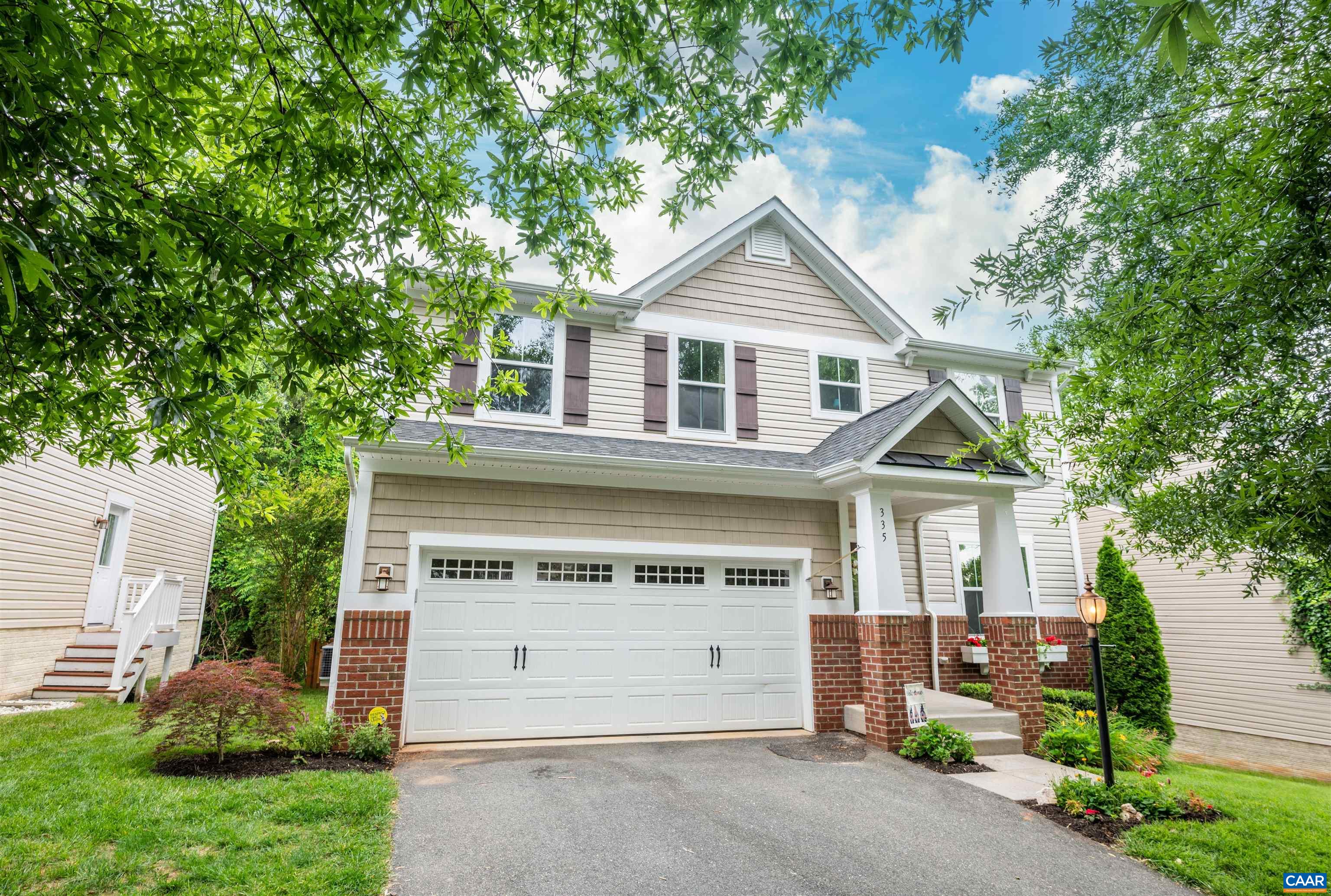 This FRESHLY PAINTED 4-BED 3.5-BATH, 3,209 FIN SQ FT home features an ATTACHED 2-CAR GARAGE, a FIRST FLOOR HOME OFFICE/STUDY with picturesque french doors, and a FINISHED WALK-OUT BASEMENT with full bath, home gym, spacious rec room, and expansive storage space! Grill out on the SUNNY BACK DECK or dine more formally in the FORMAL DINING ROOM with flawless chair-rail wall accents! Cozy up next to the living room FIREPLACE and rest easy in the large PRIMARY SUITE featuring TWO WALK-IN CLOSETS, dual vanities, soaker tub, glass shower, and unlimited vanity countertop space! Allow your pet to roam free in the FENCED-IN, PRIVATE BACKYARD with FIRE PIT! Beautifully situated within a CUL-DE-SAC street within the LIBERTY HALL neighborhood, located right across the street from Harris Teeter grocery, 5 minutes from Western Albemarle High School and historic downtown Crozet, 7 minutes from Beaver Creek Reservoir Park and Claudius Crozet Parks, and just 20 minutes from Charlottesville/UVA/the hospital! Open House Sat 5/13 2-4PM!