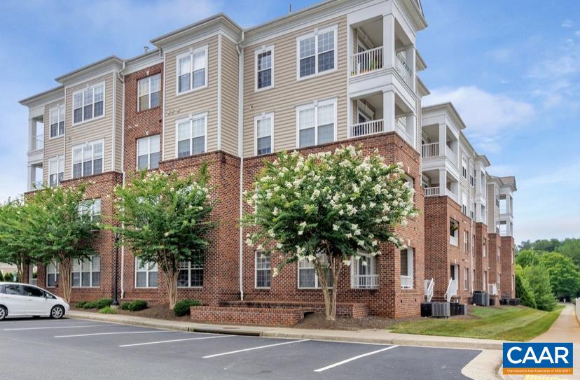 Tremendous opportunity to own a single-level condominium with first floor master bedroom and garage parking. Come home from work and park in secure garage and take elevator to your condo. Upgrades inside include granite, 9' ceilings, stainless appliances, soaker tub and separate walk-in tile shower, covered patio and an abundance of natural light. Community offers swimming pool, fitness center, playground, all grounds maintenance and so much more. This is truly a low maintenance place to call home with plenty of amenities. Gas cooking, gas heat, gas hot water and central air conditioning and condo includes designated storage unit in garage. HOA includes water & sewer, trash, snow removal, pool & fitness, grounds keeping and more. move in, relax and enjoy everything this condo has to offer.